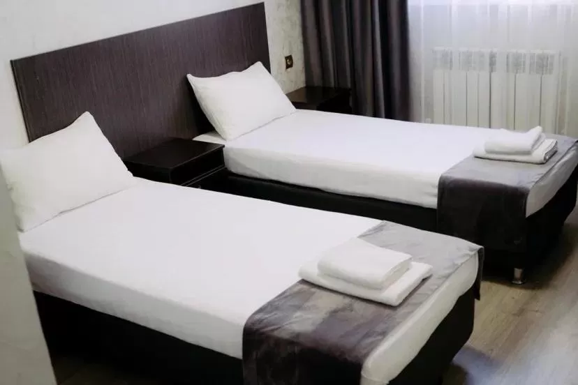 Bed in Rush Hotel