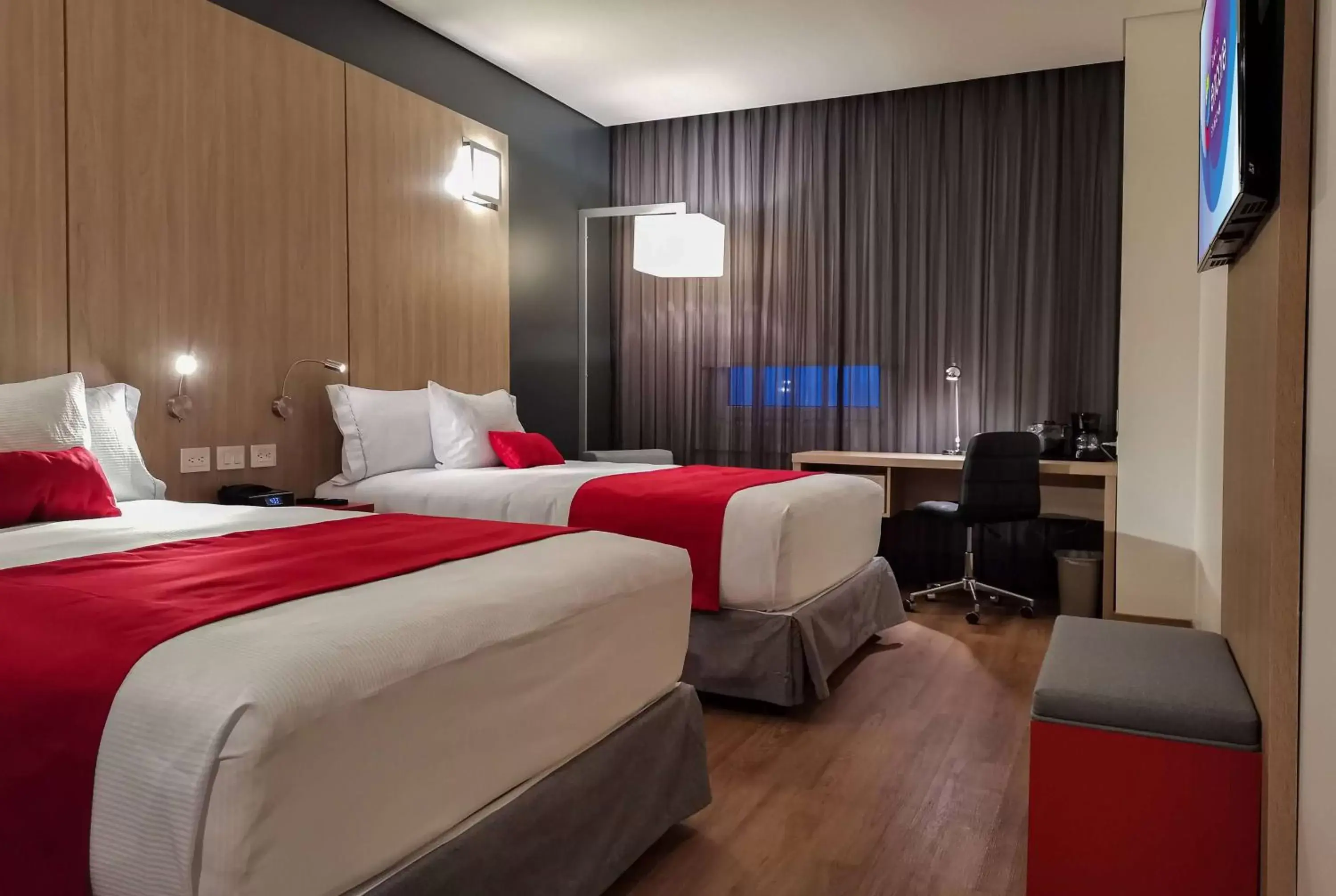 Photo of the whole room, Bed in Ramada Encore by Wyndham Guadalajara Aeropuerto