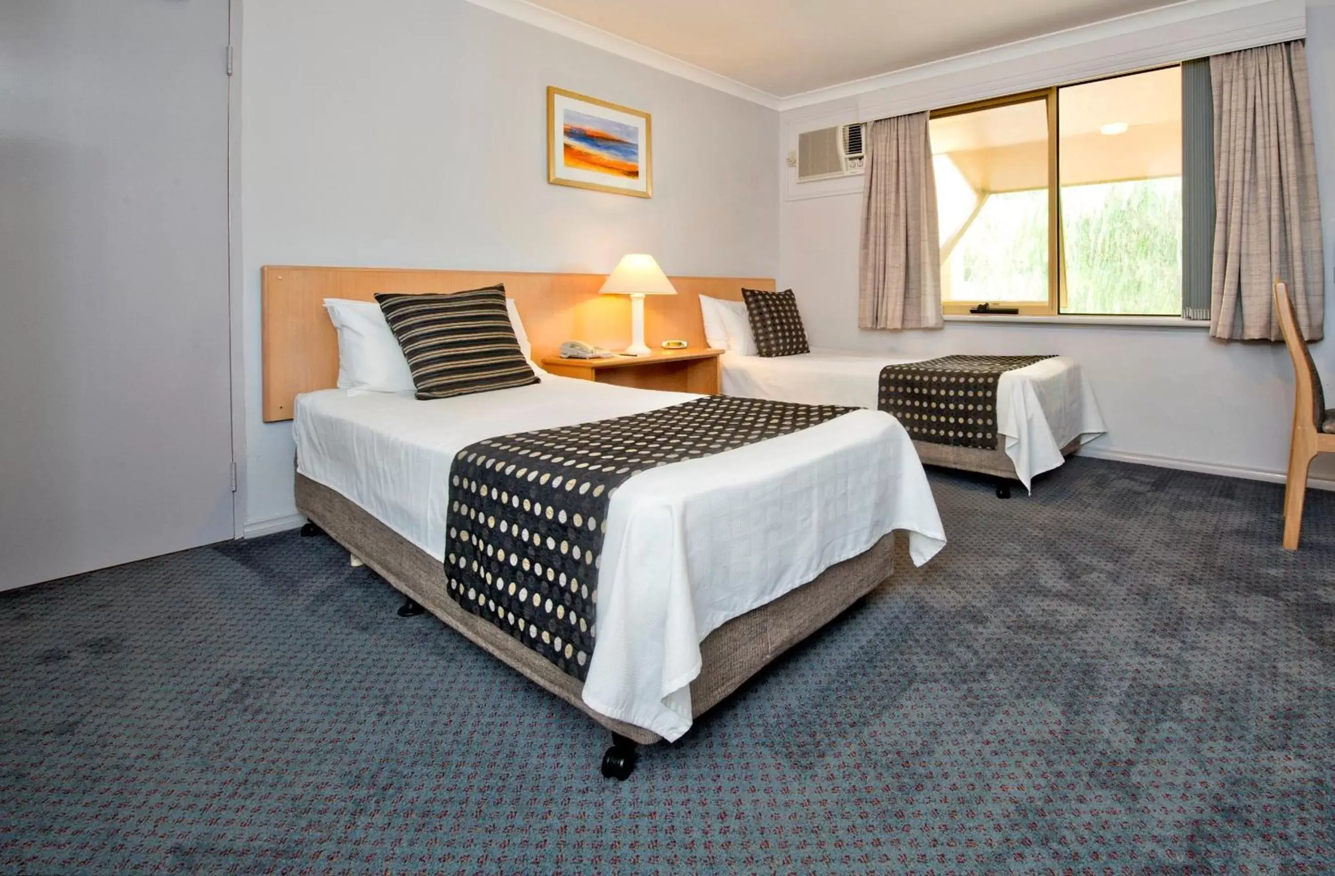 Bed in Abbey Beach Resort