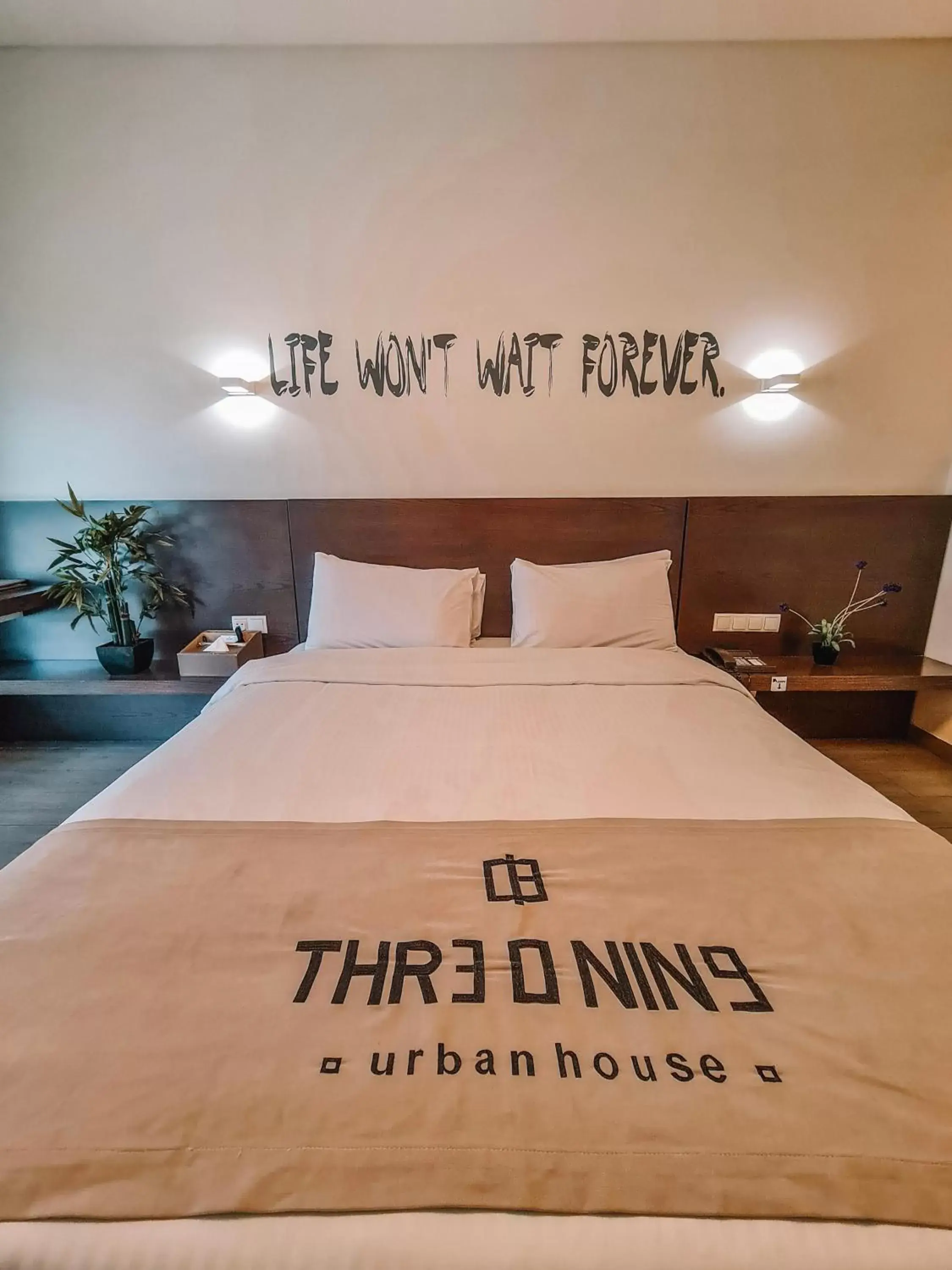 Bed, Property Logo/Sign in Three O Nine Hotel