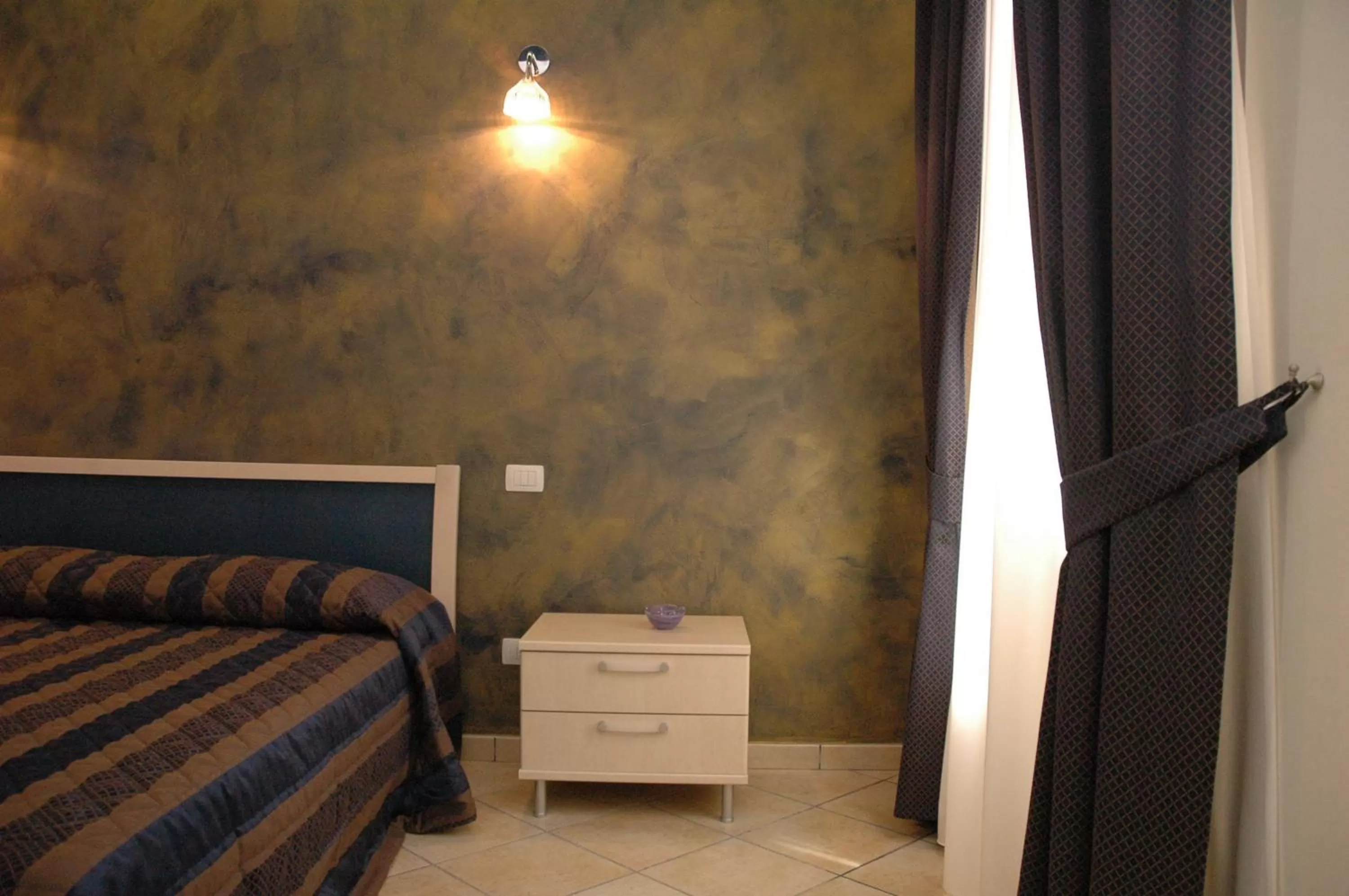 Decorative detail, Bed in Residenza Glave