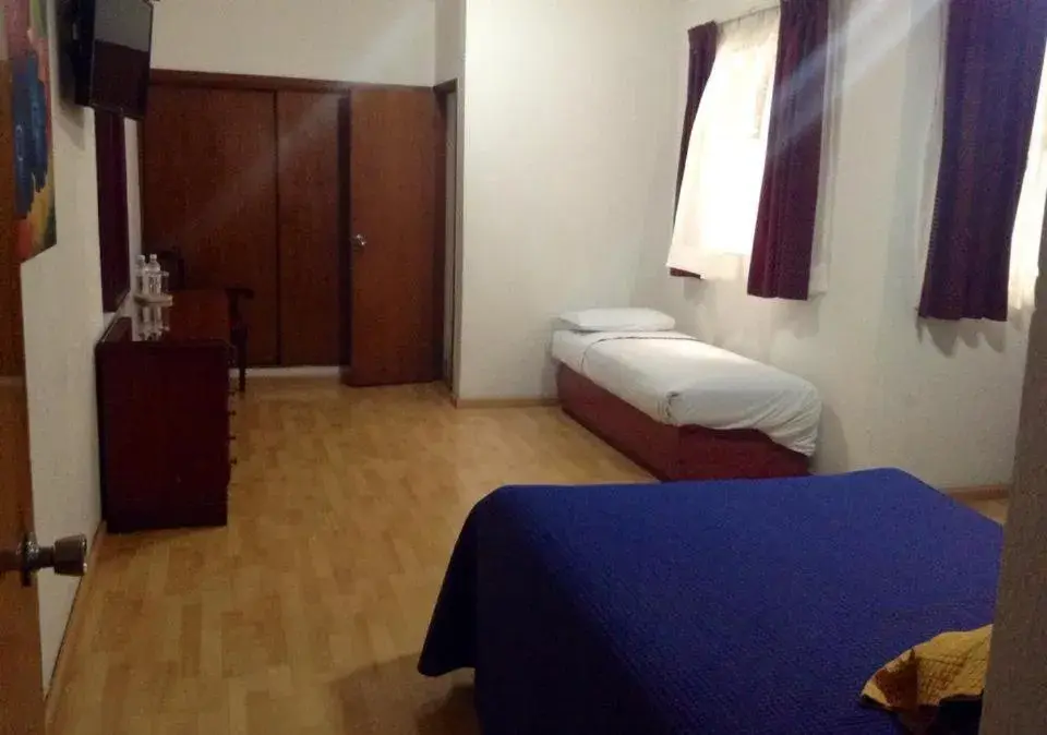 Photo of the whole room, Bed in Gala Oaxaca