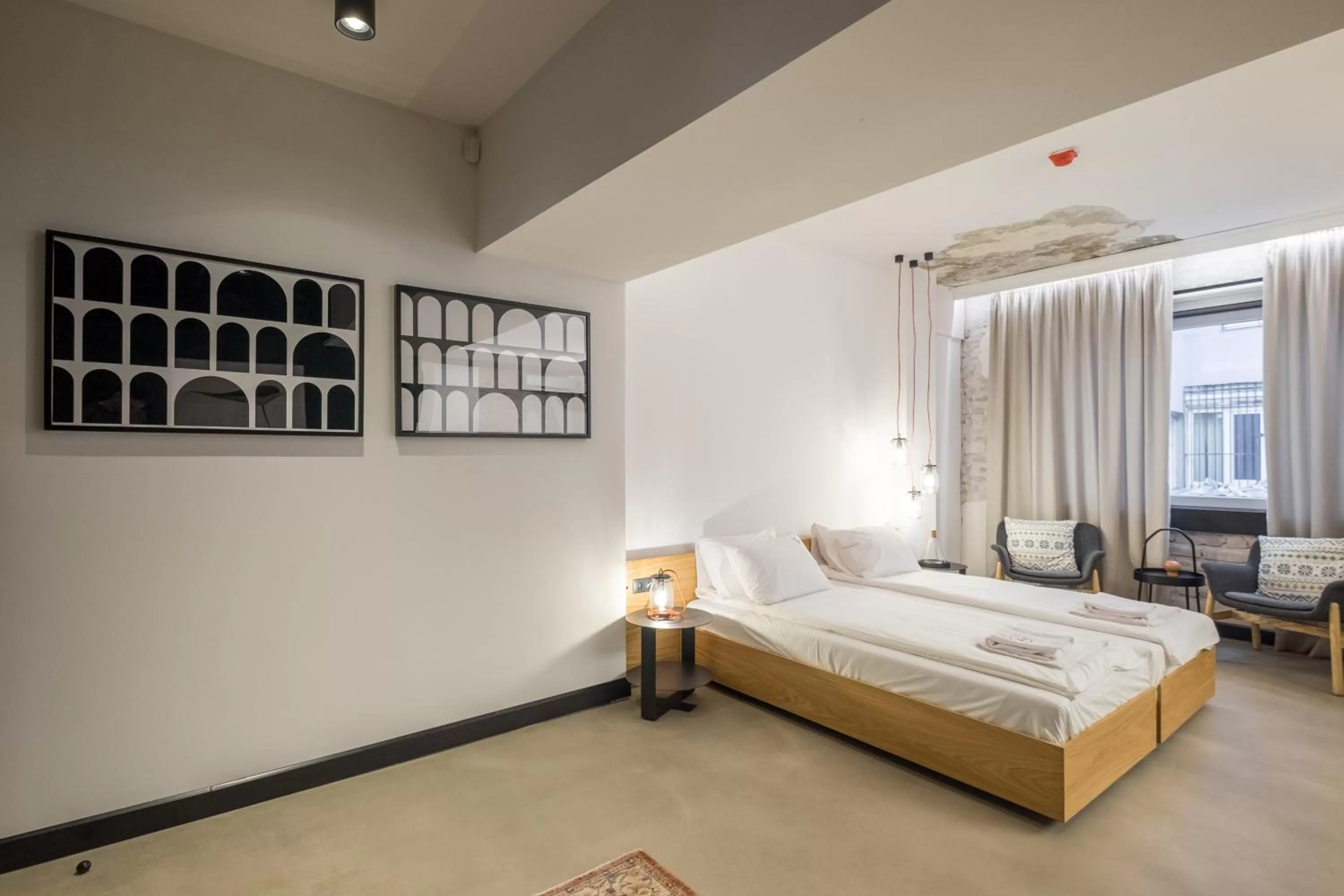 Bed in R34 Boutique Hotel