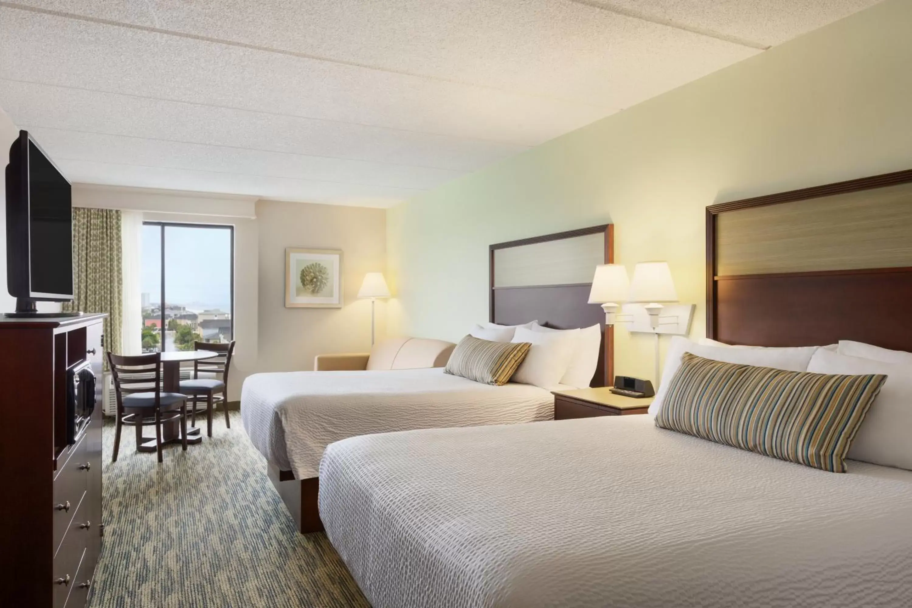 Photo of the whole room, Bed in Surfside Beach Oceanfront Hotel