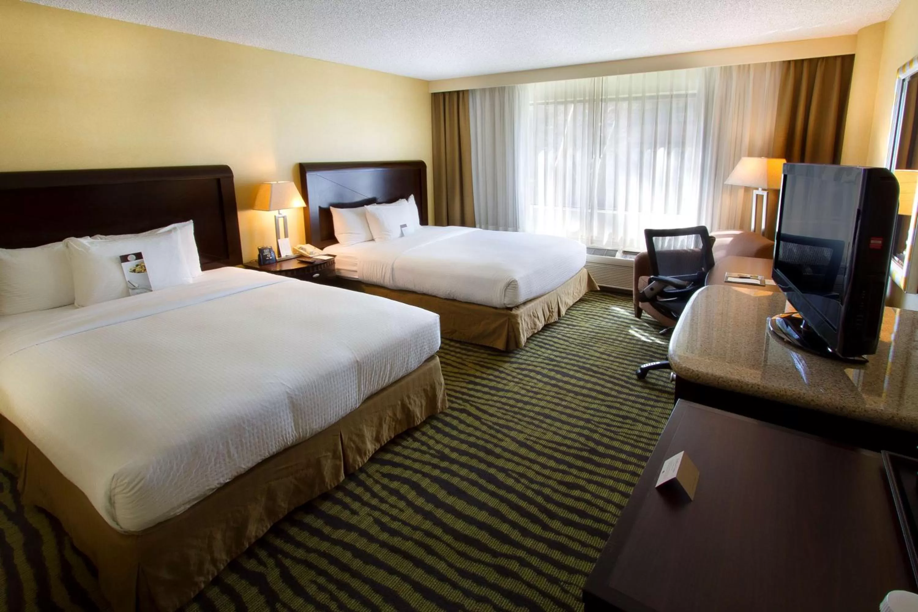 Bed in DoubleTree by Hilton Orange County Airport