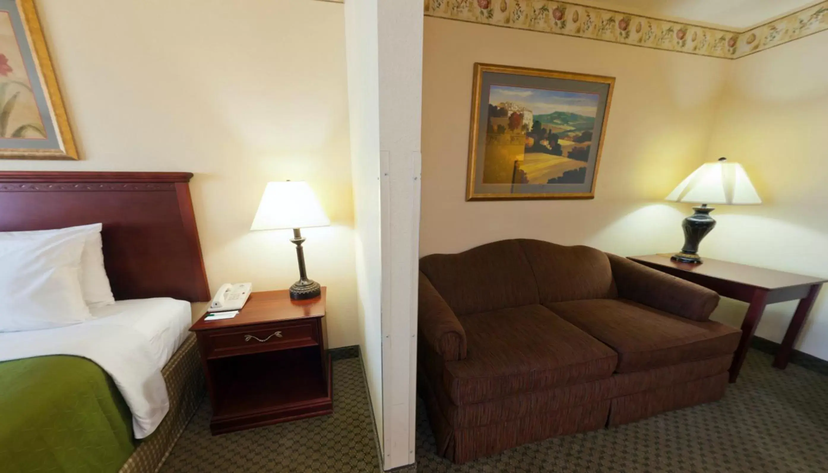 Seating area, Bed in Country Inn & Suites by Radisson, St. Cloud East, MN