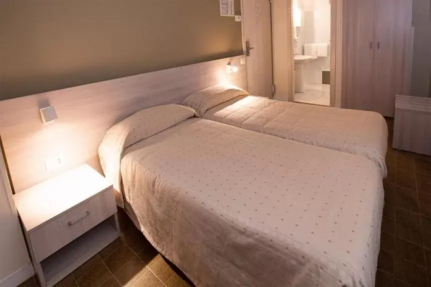 Bed in Hotel Scacciapensieri