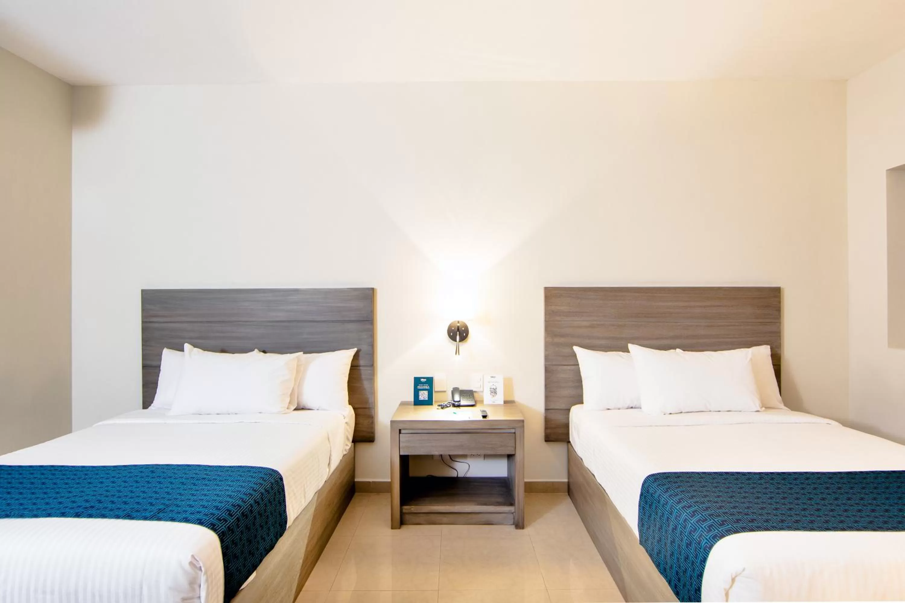 Bed in InHouse Hotel Culiacán