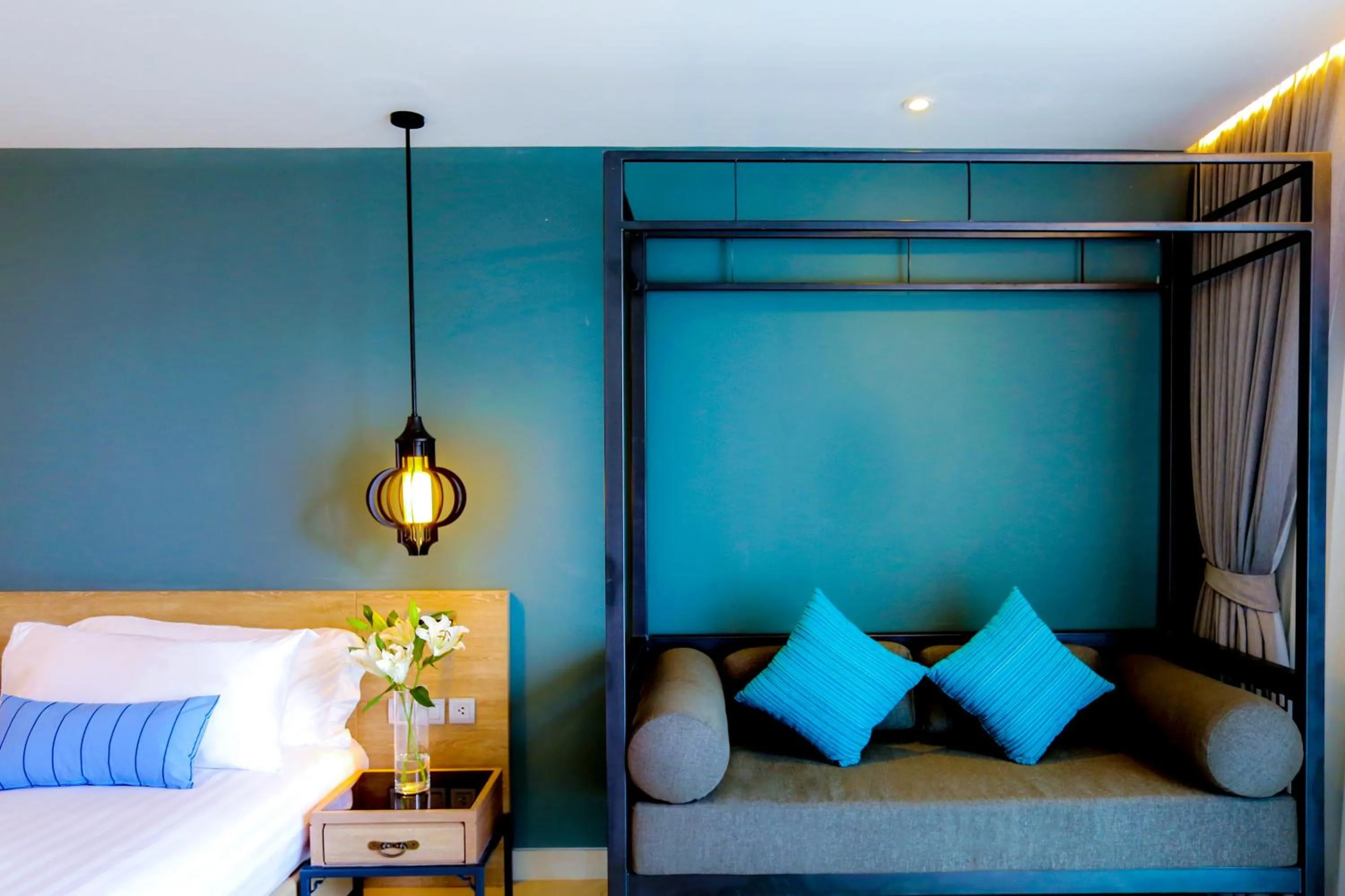 Seating area, Bed in MAI HOUSE Patong Hill