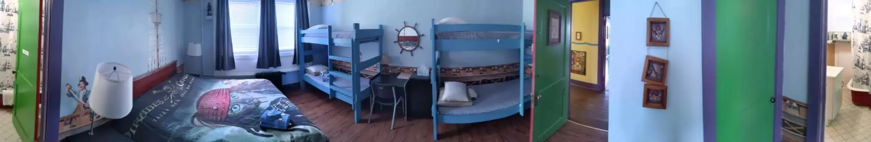 Bed in The Pirate Haus Inn