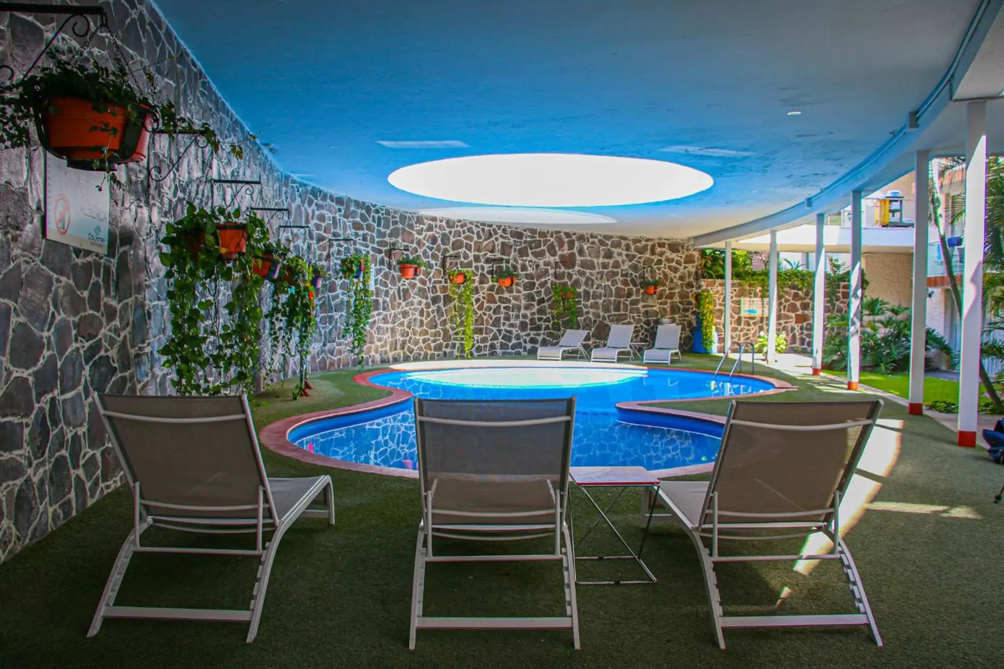 Swimming Pool in Country Hotel & Suites