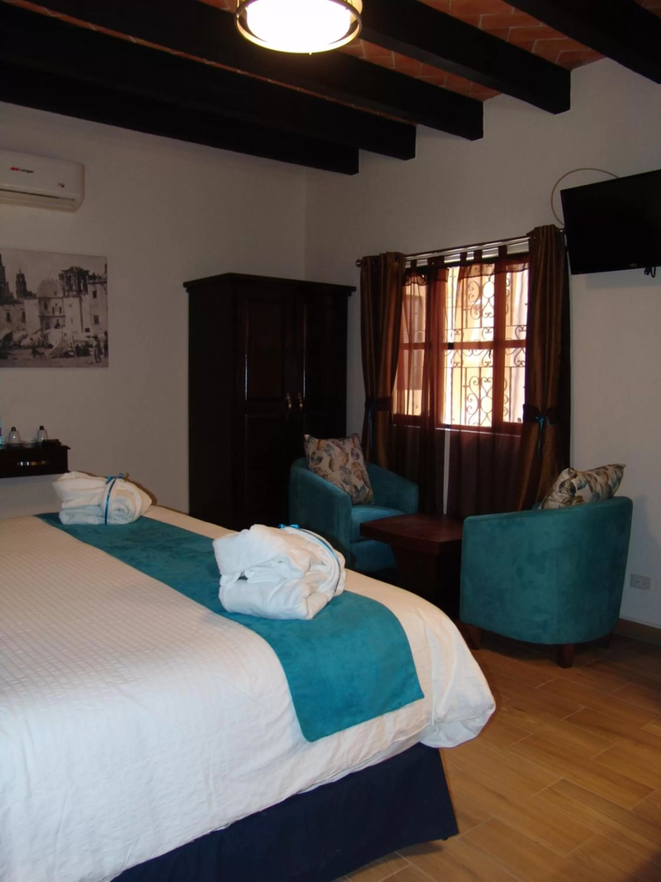 Bed in Hotel Casa Don Quijote