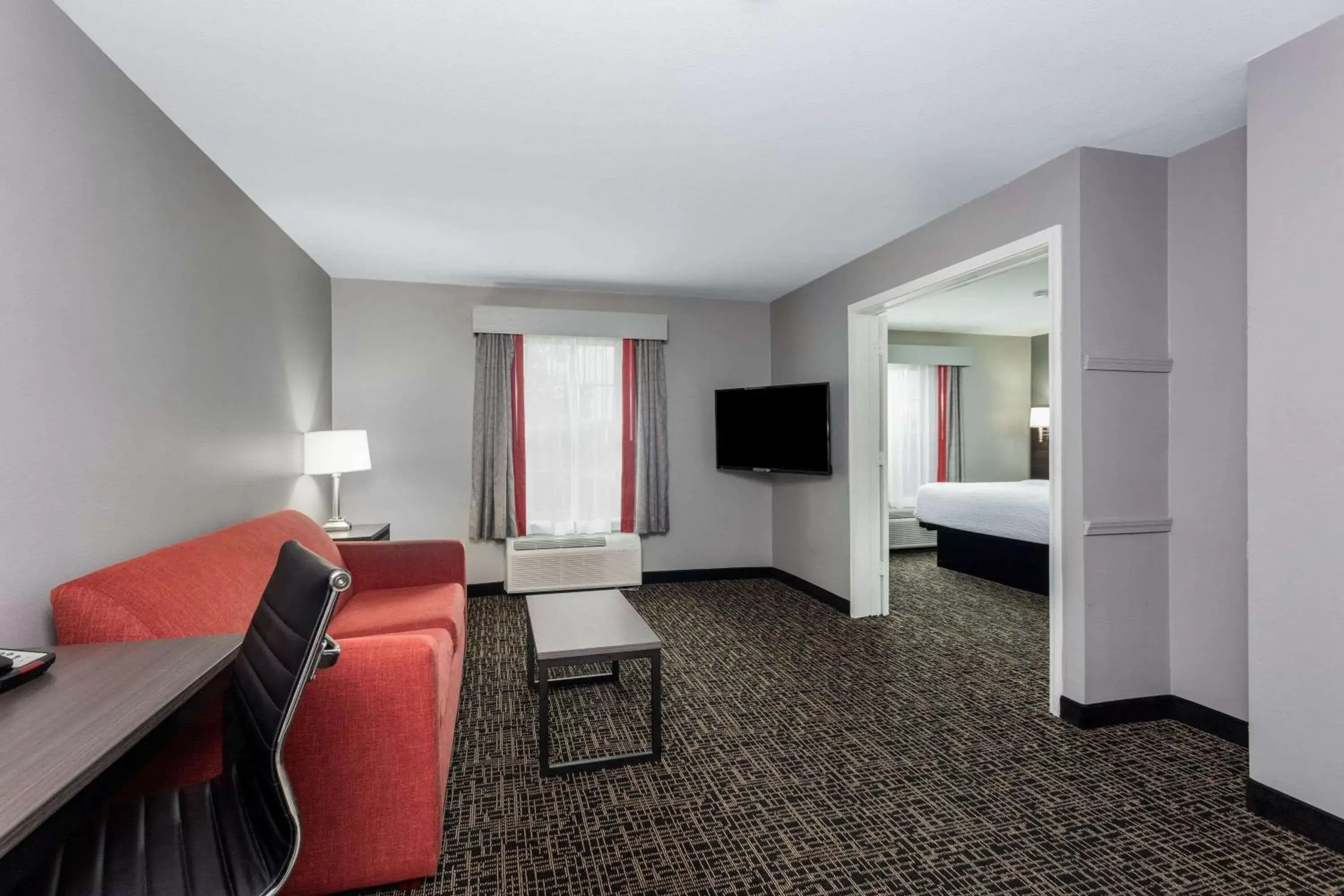 Photo of the whole room, Seating Area in Ramada by Wyndham Sellersburg/Louisville North