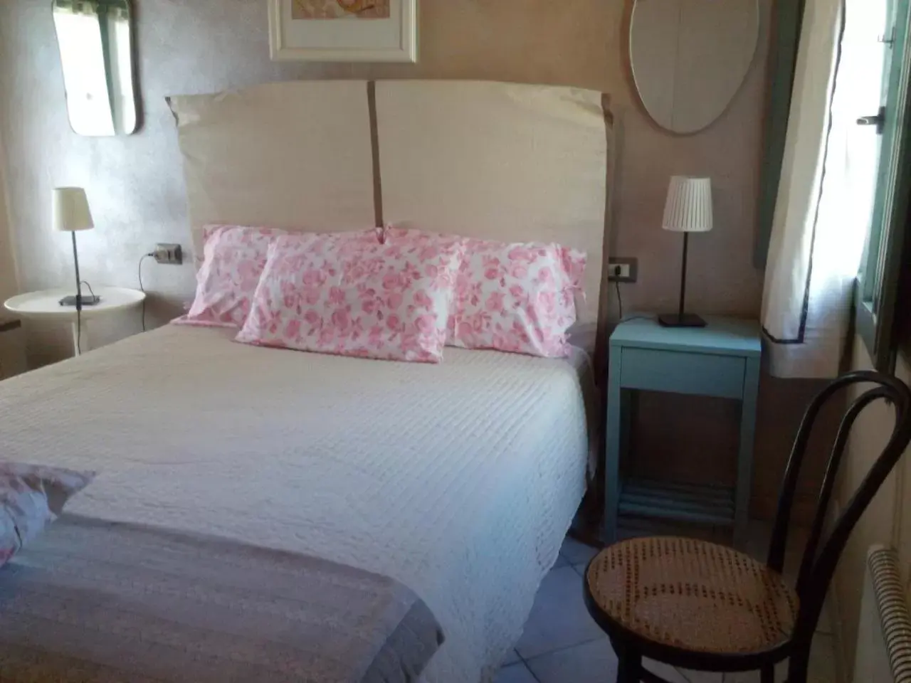 Photo of the whole room, Bed in Il Giardino Di Emilio