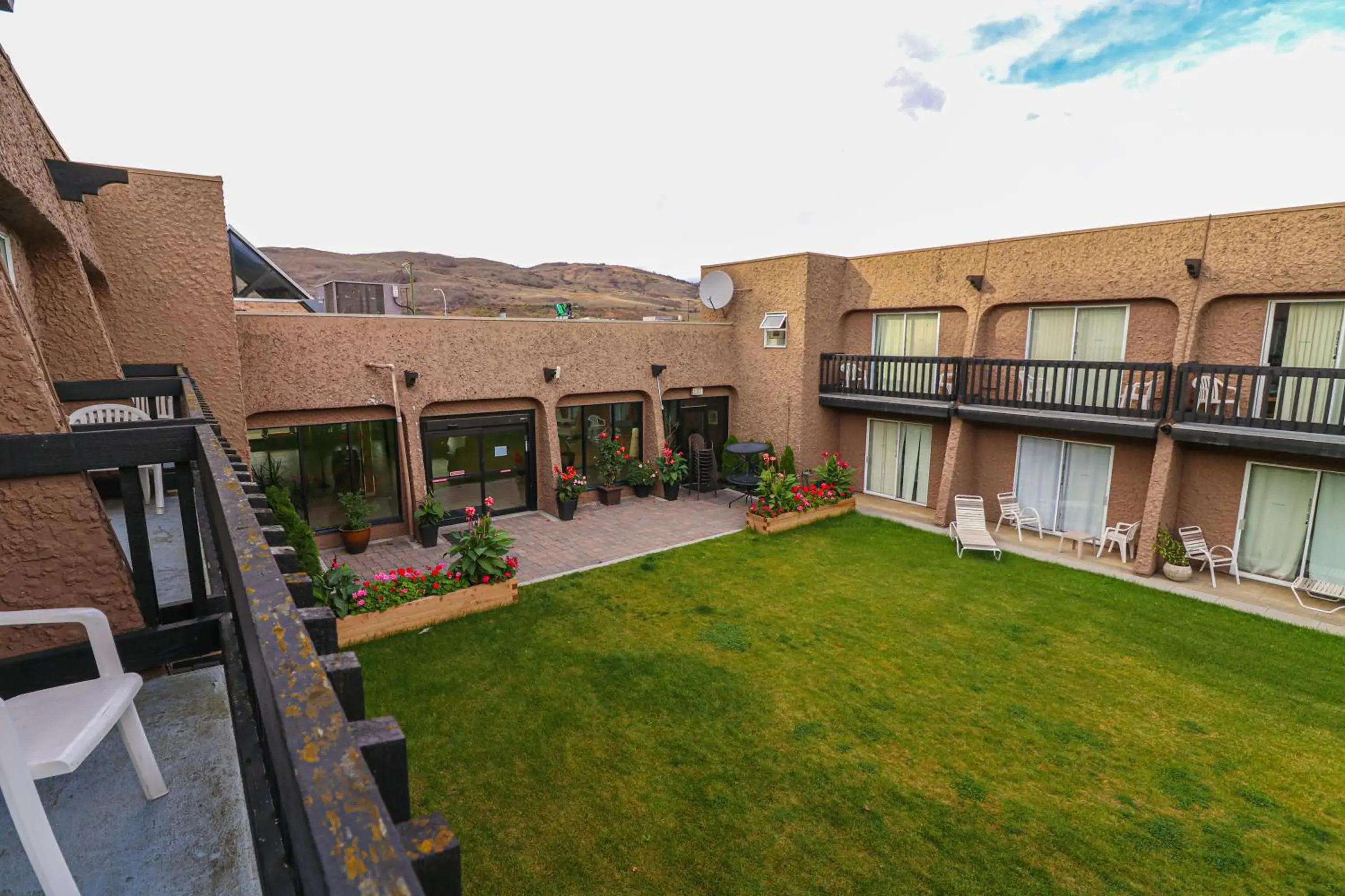 Garden view, Property Building in DIVYA SUTRA Riviera Plaza and Conference Centre, Vernon, BC