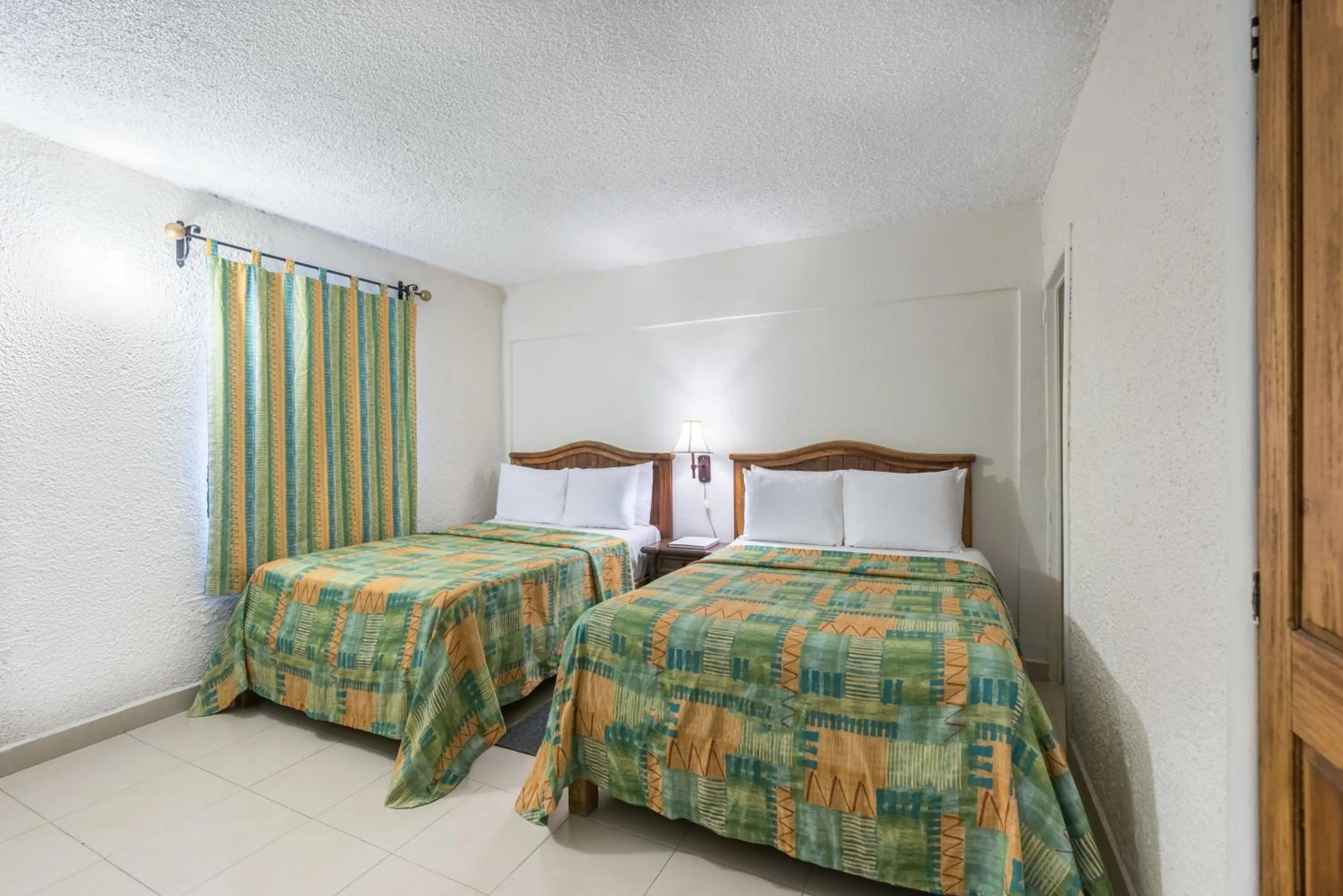 Bedroom in Hotel Abadia Plaza