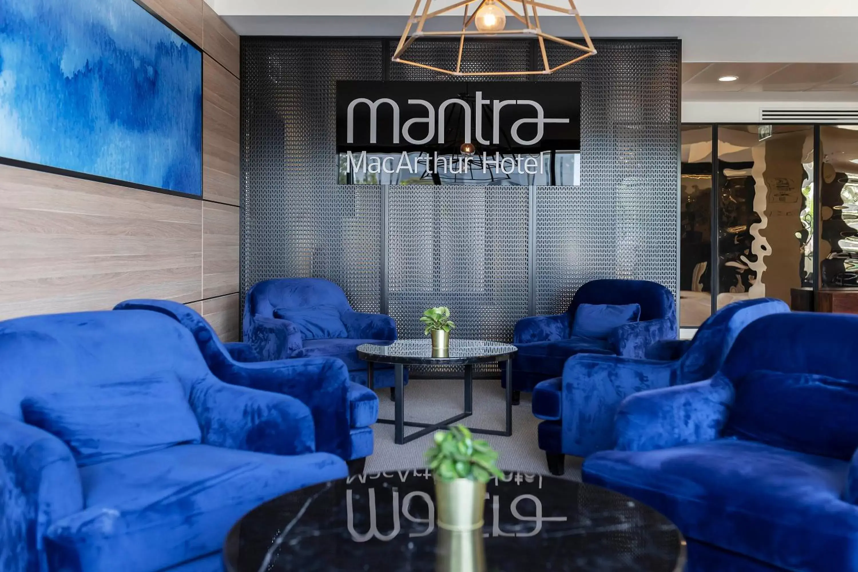 Lobby or reception in Mantra MacArthur Hotel