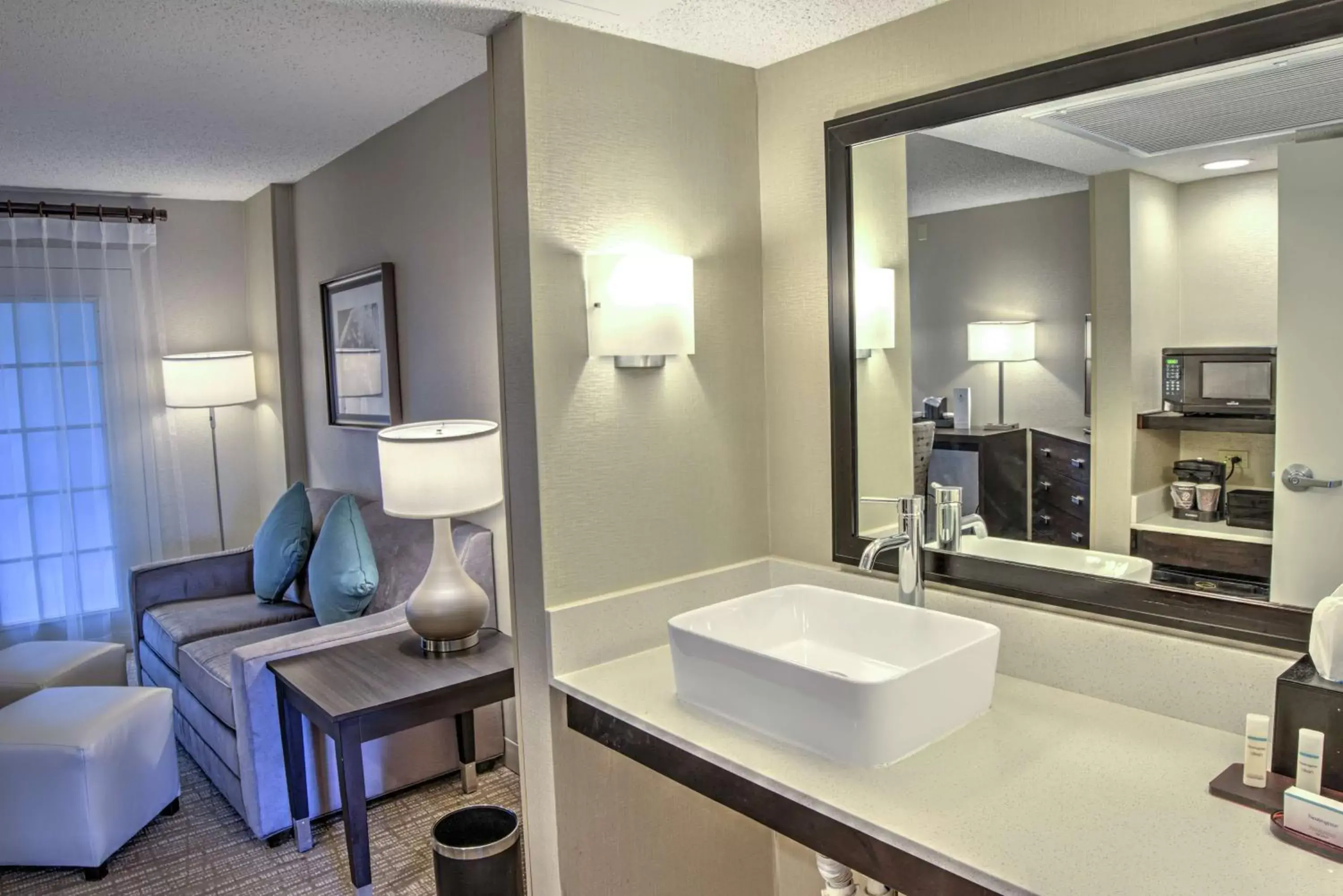 Living room, Bathroom in Embassy Suites by Hilton Indianapolis North