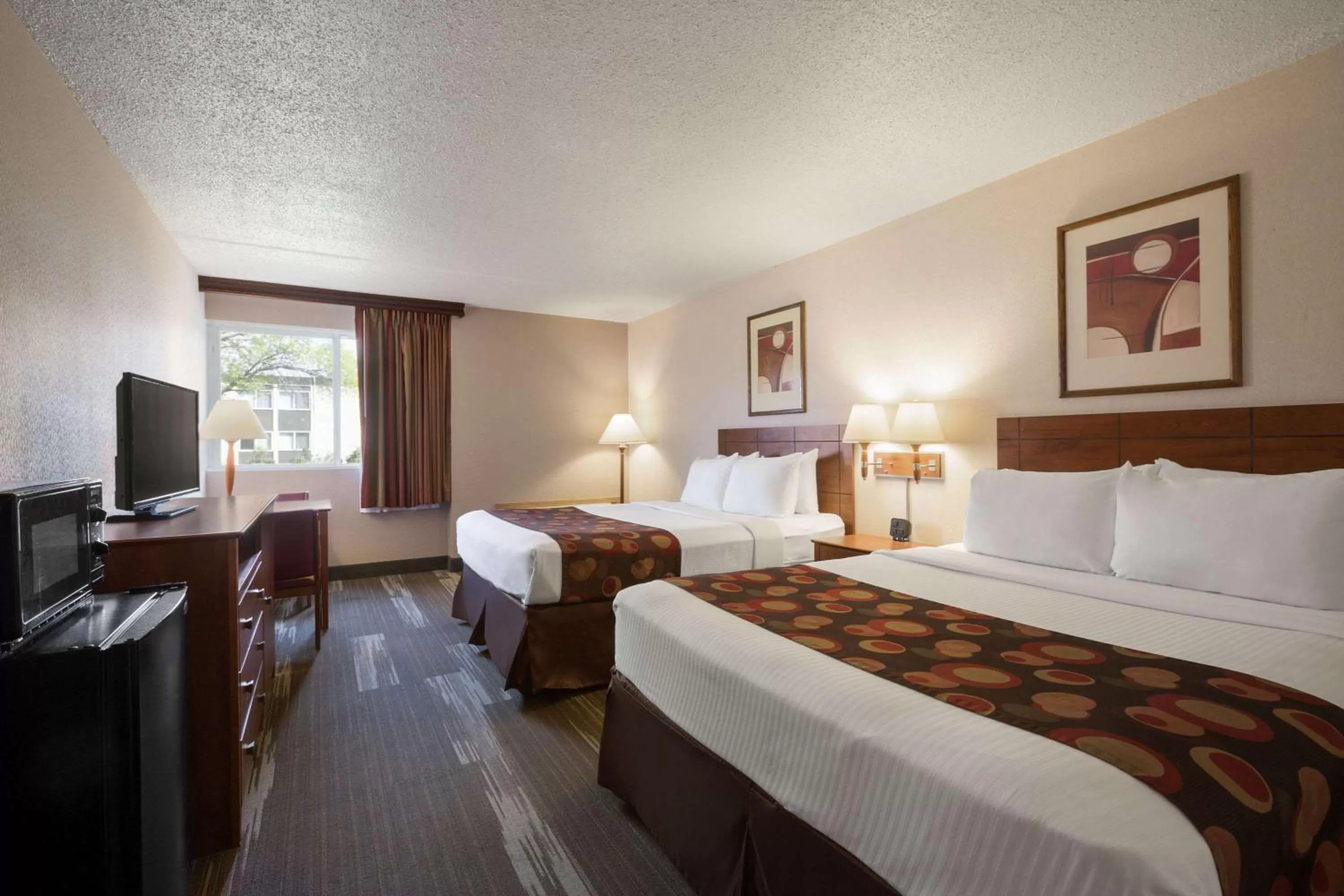 Photo of the whole room, Bed in Ramada by Wyndham Bismarck