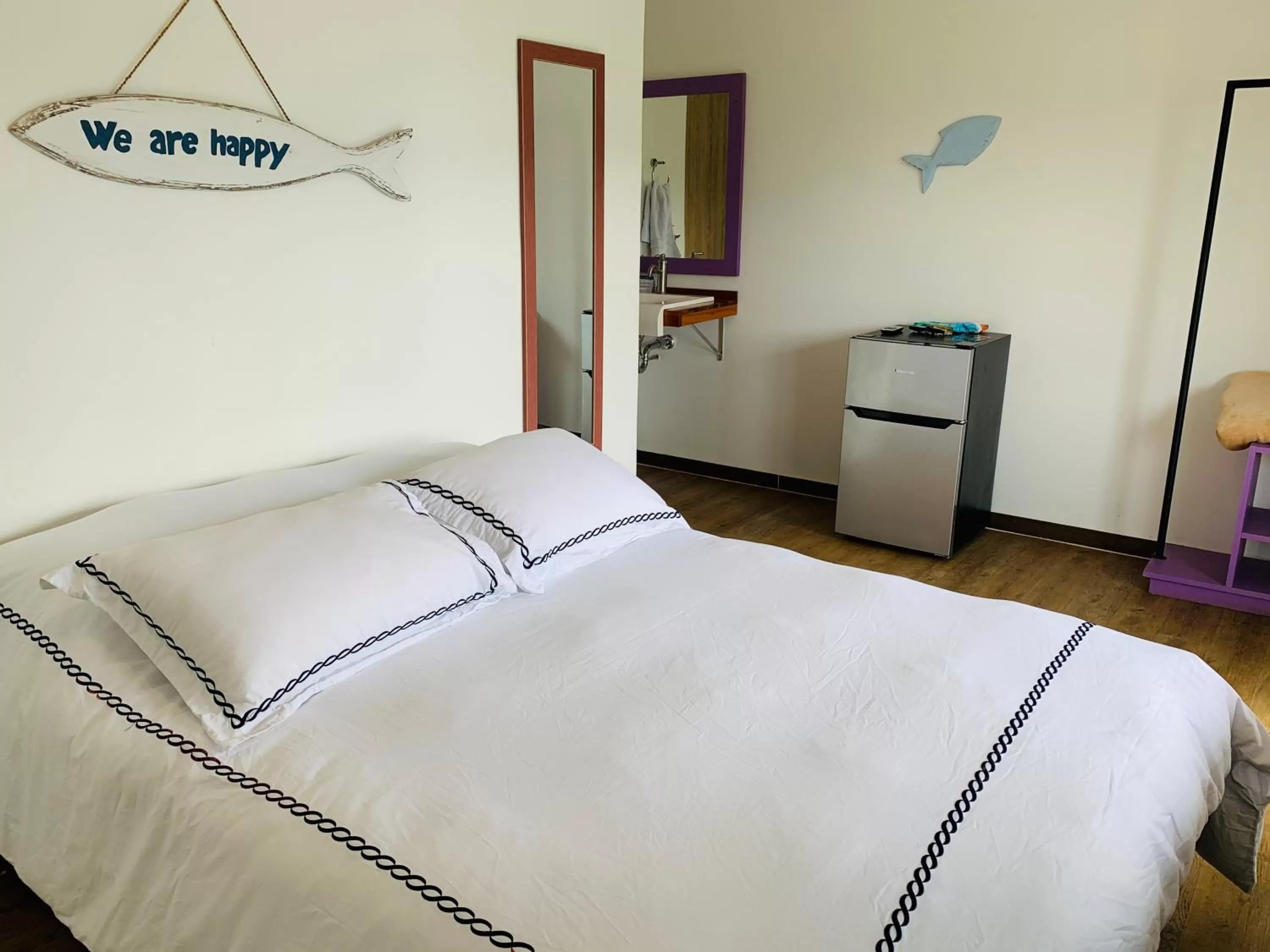 Bed in Be Happy Hotel