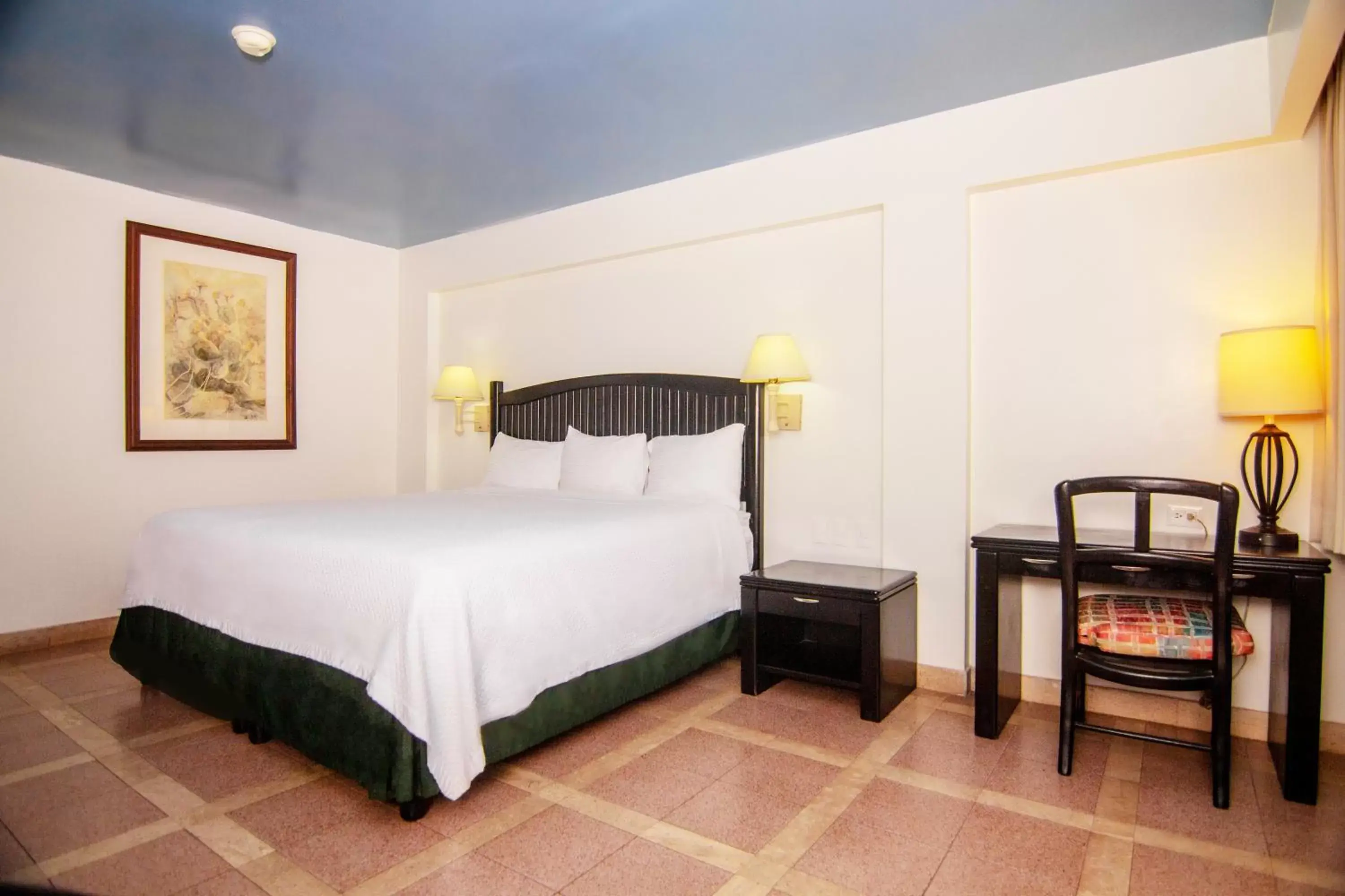 Bed in Gamma Guaymas Armida Hotel