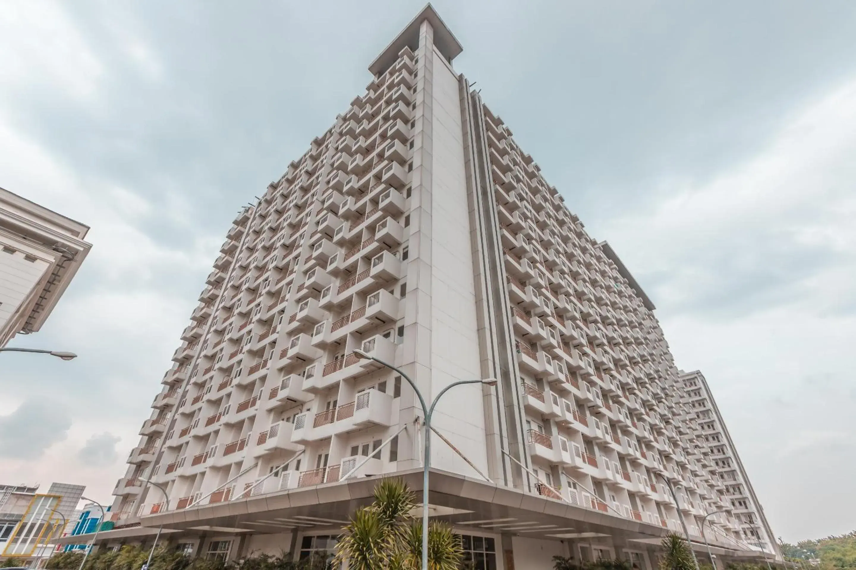 Facade/entrance, Property Building in OYO 1948 Apartement Sentul Tower