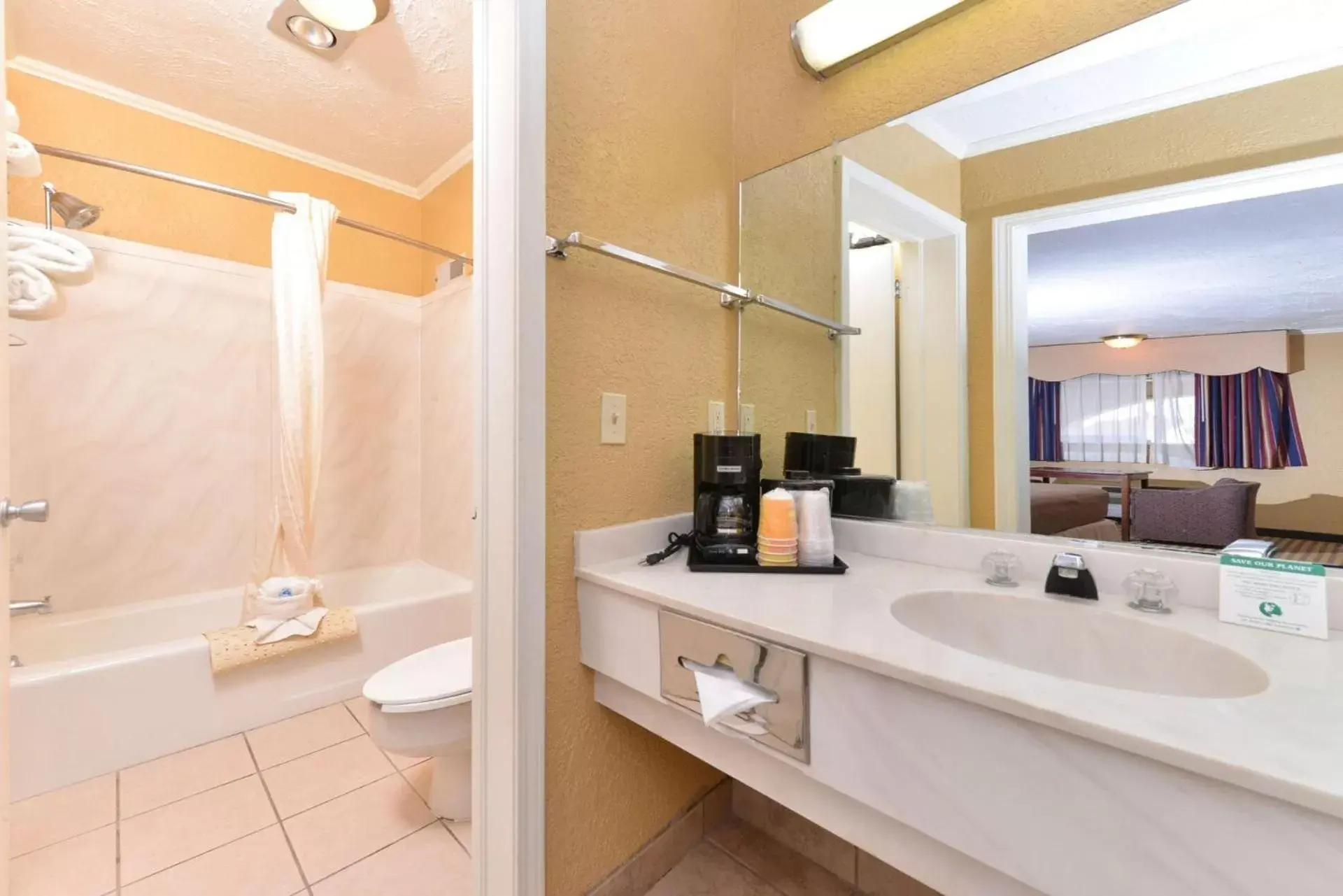 Bathroom in Executive Plus Inn and Suites