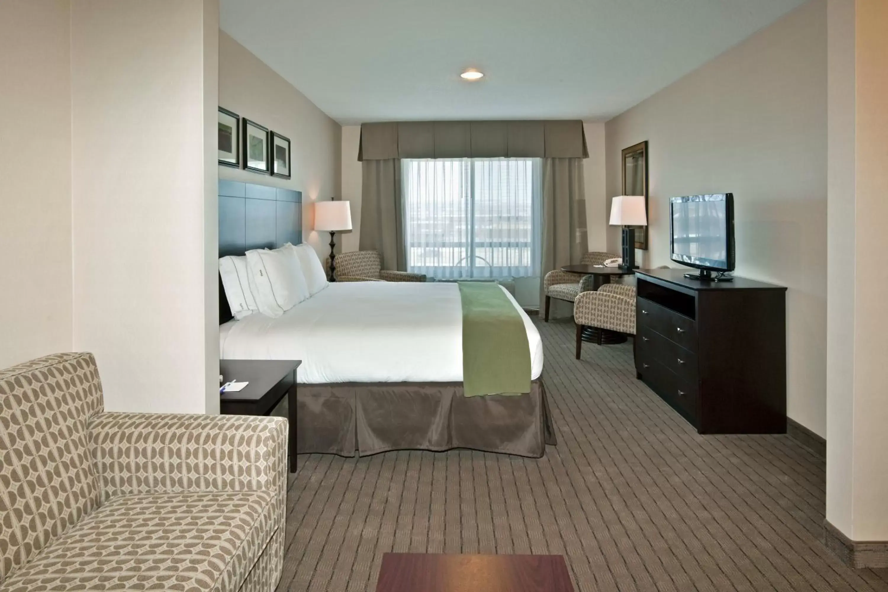 Bedroom in Holiday Inn Express Hotels Grants - Milan, an IHG Hotel
