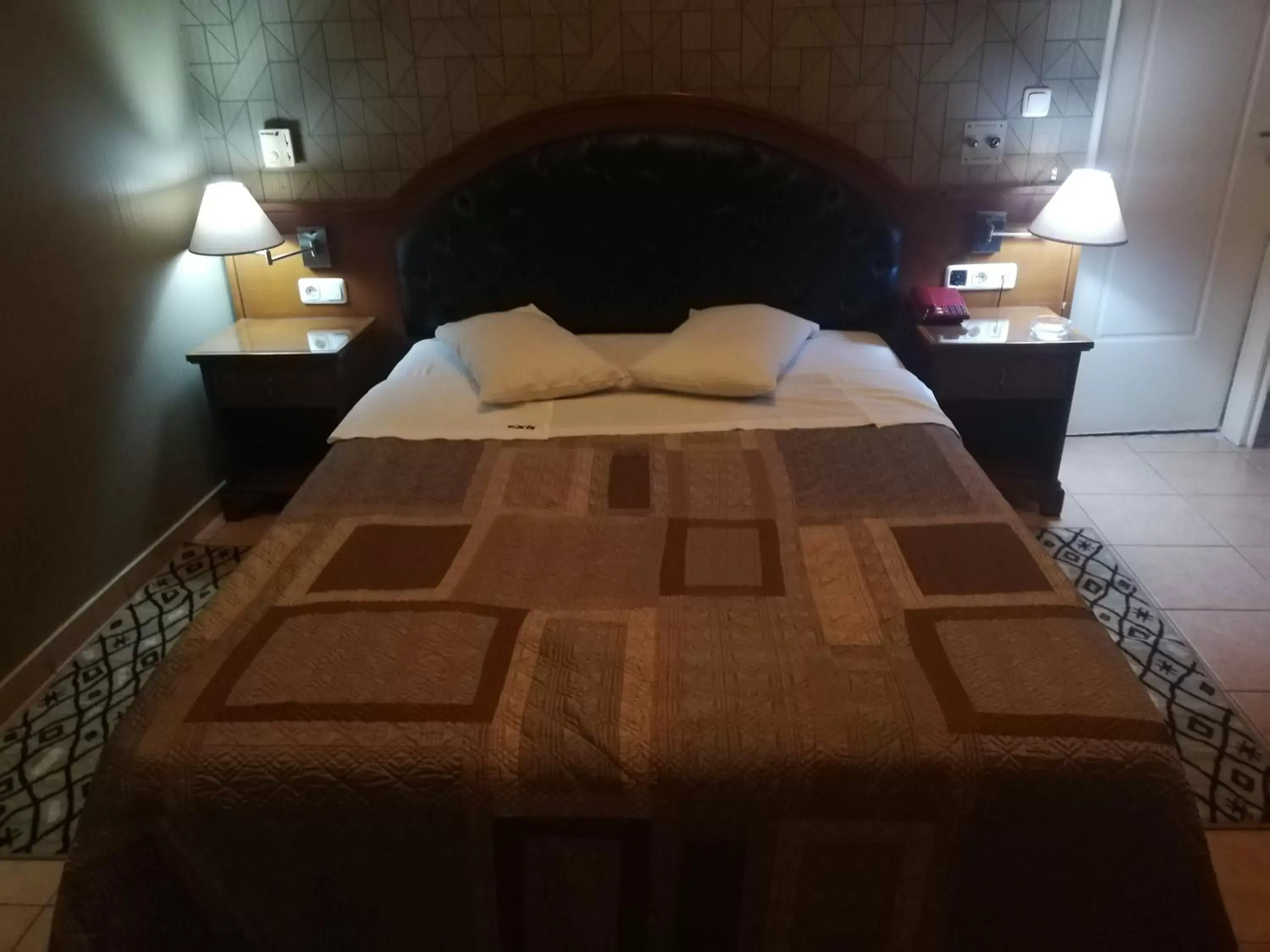 Bed in Exis Hotel