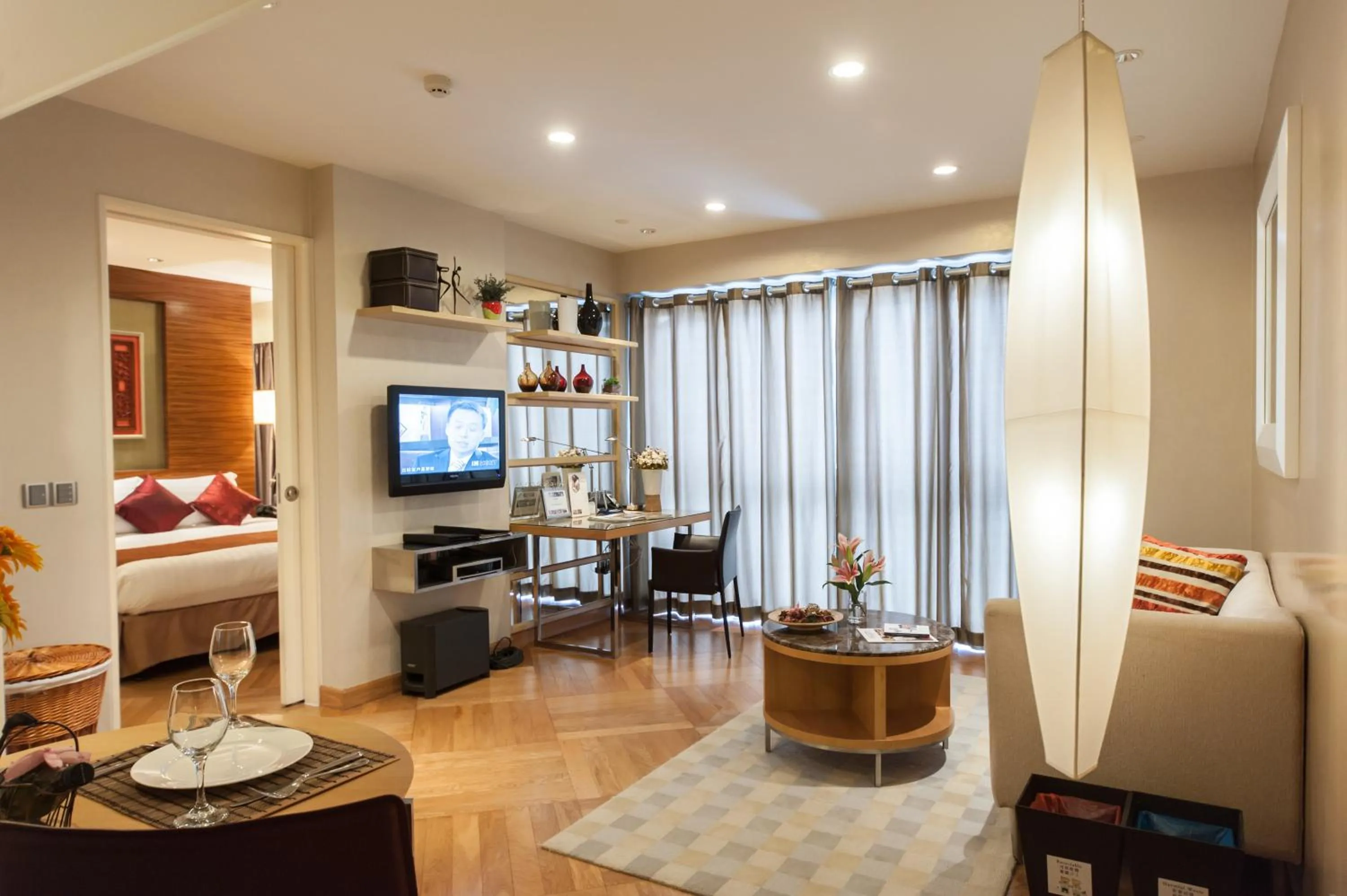 Living room, Bed in Ascott Guangzhou
