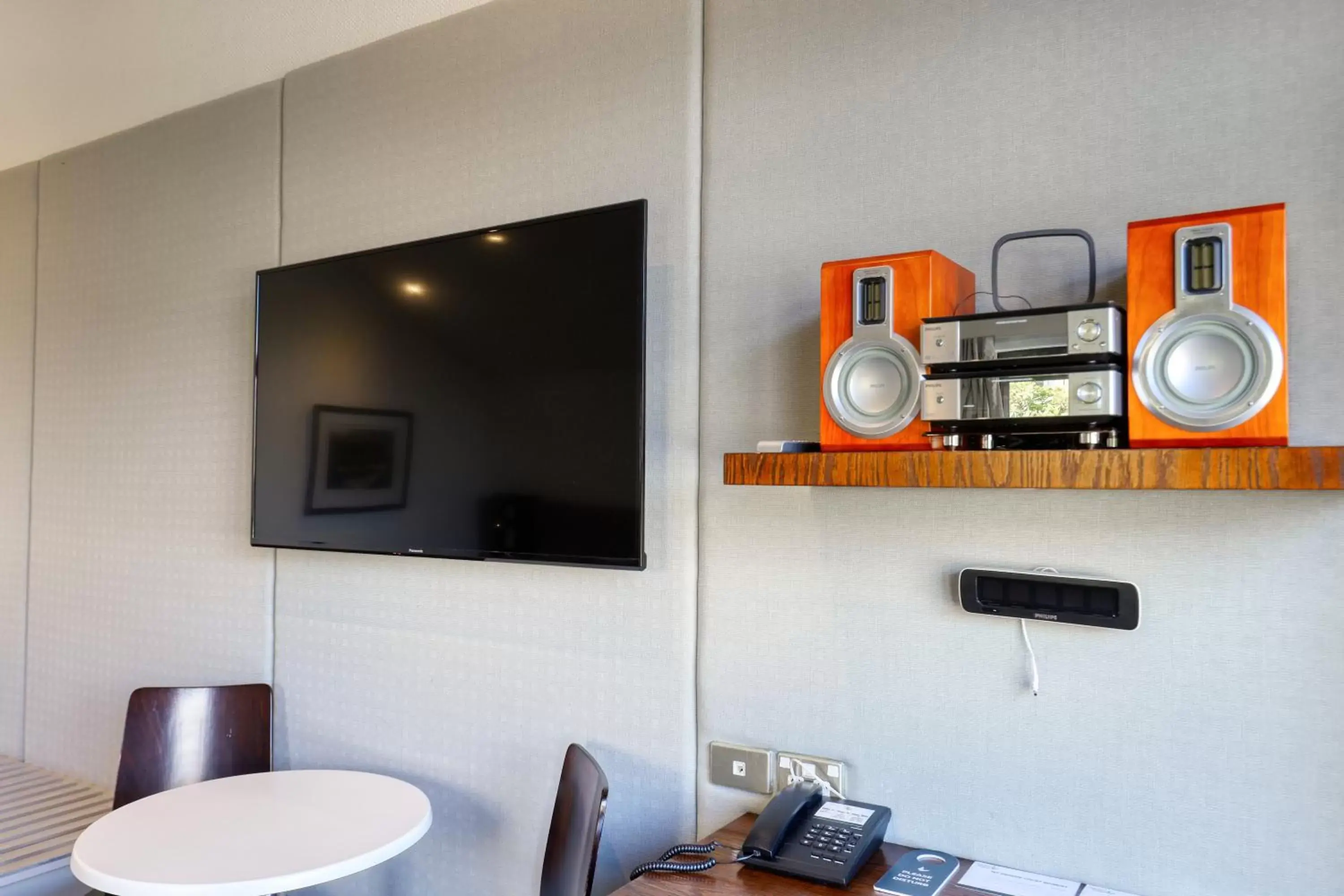 Living room, Bathroom in Garden Court Suites & Apartments