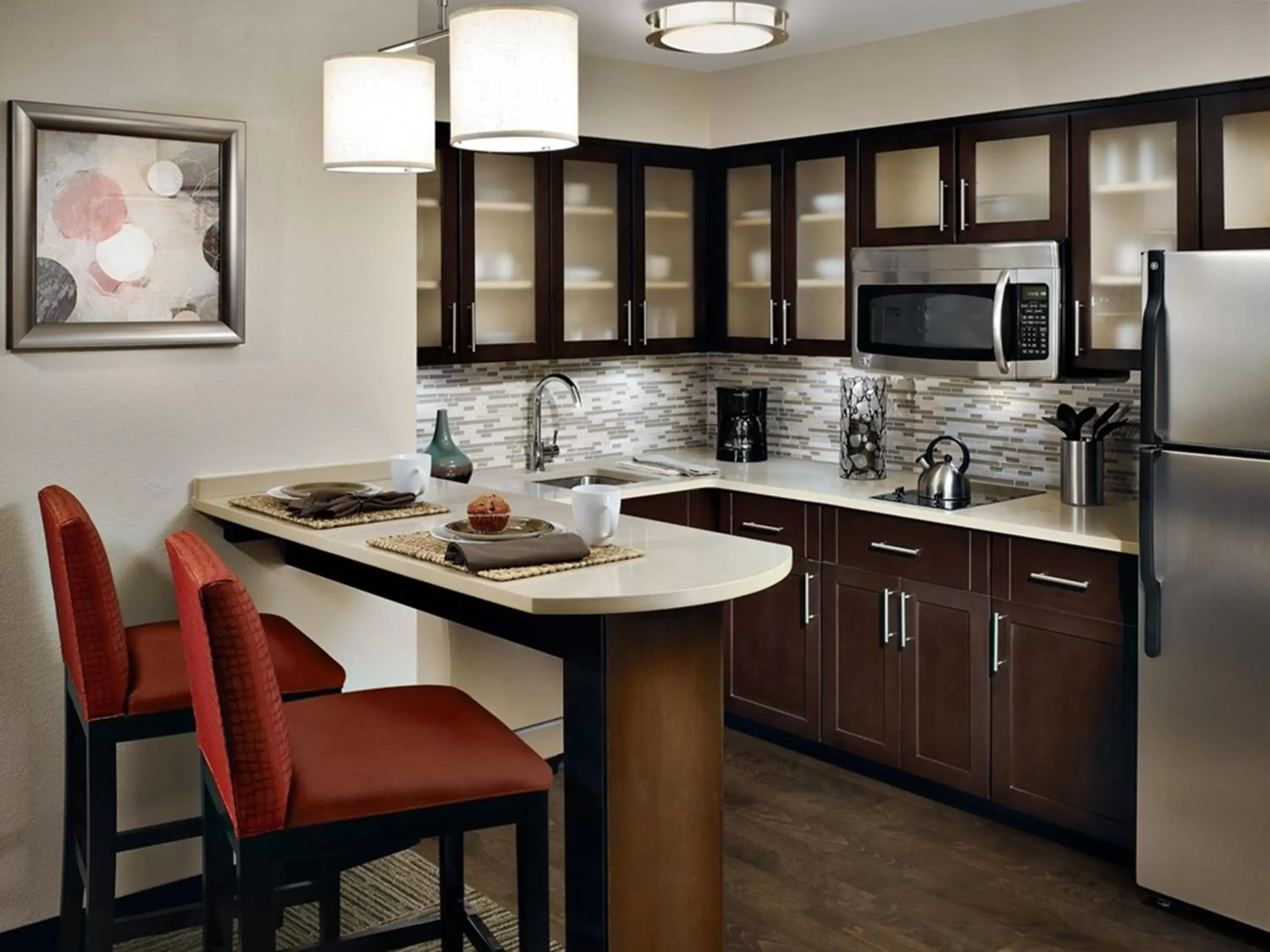 Bedroom, Kitchen/Kitchenette in Staybridge Suites Auburn Hills, an IHG Hotel