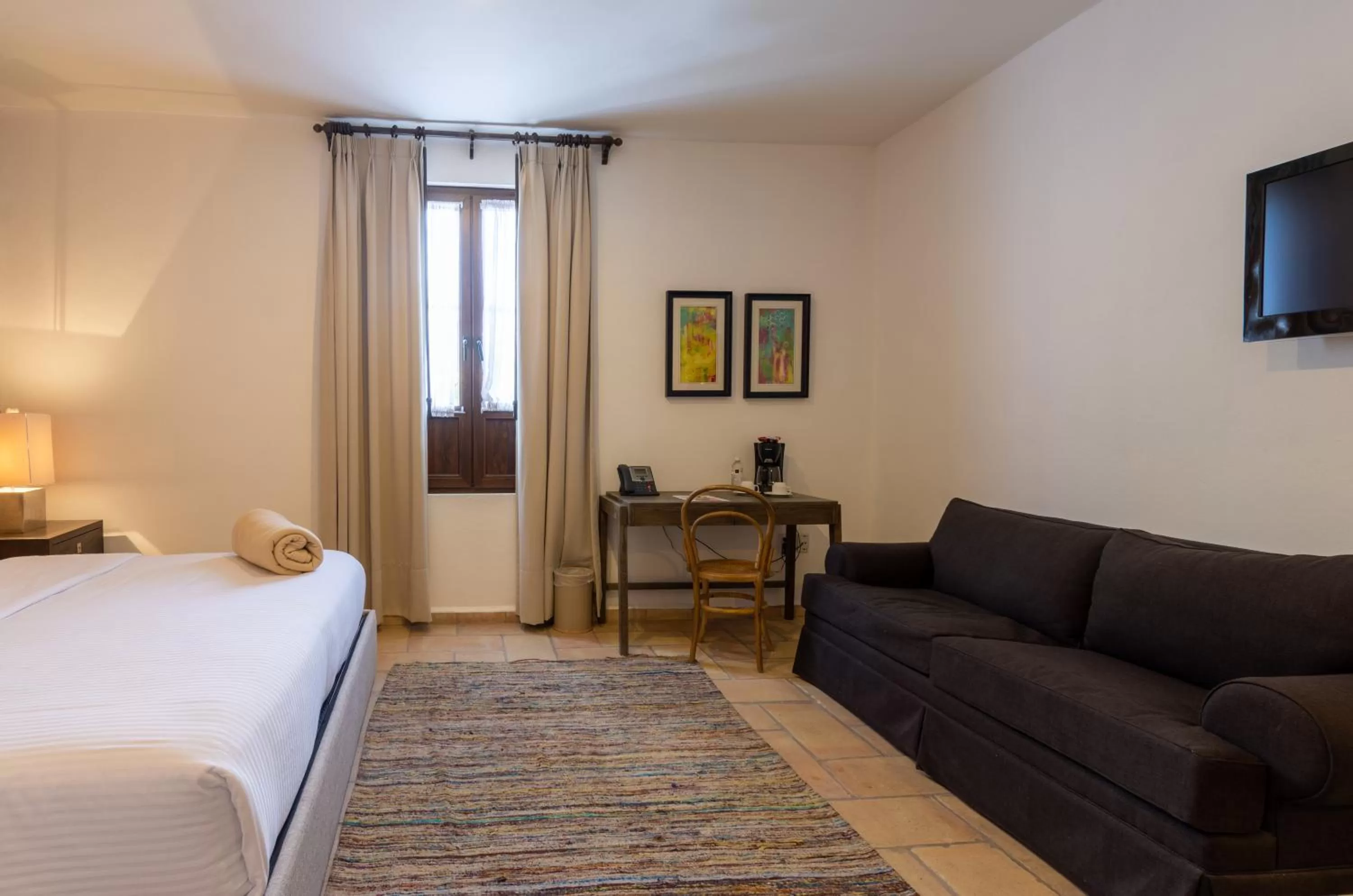 Living room, Bed in Hotel Hacienda San Cristóbal