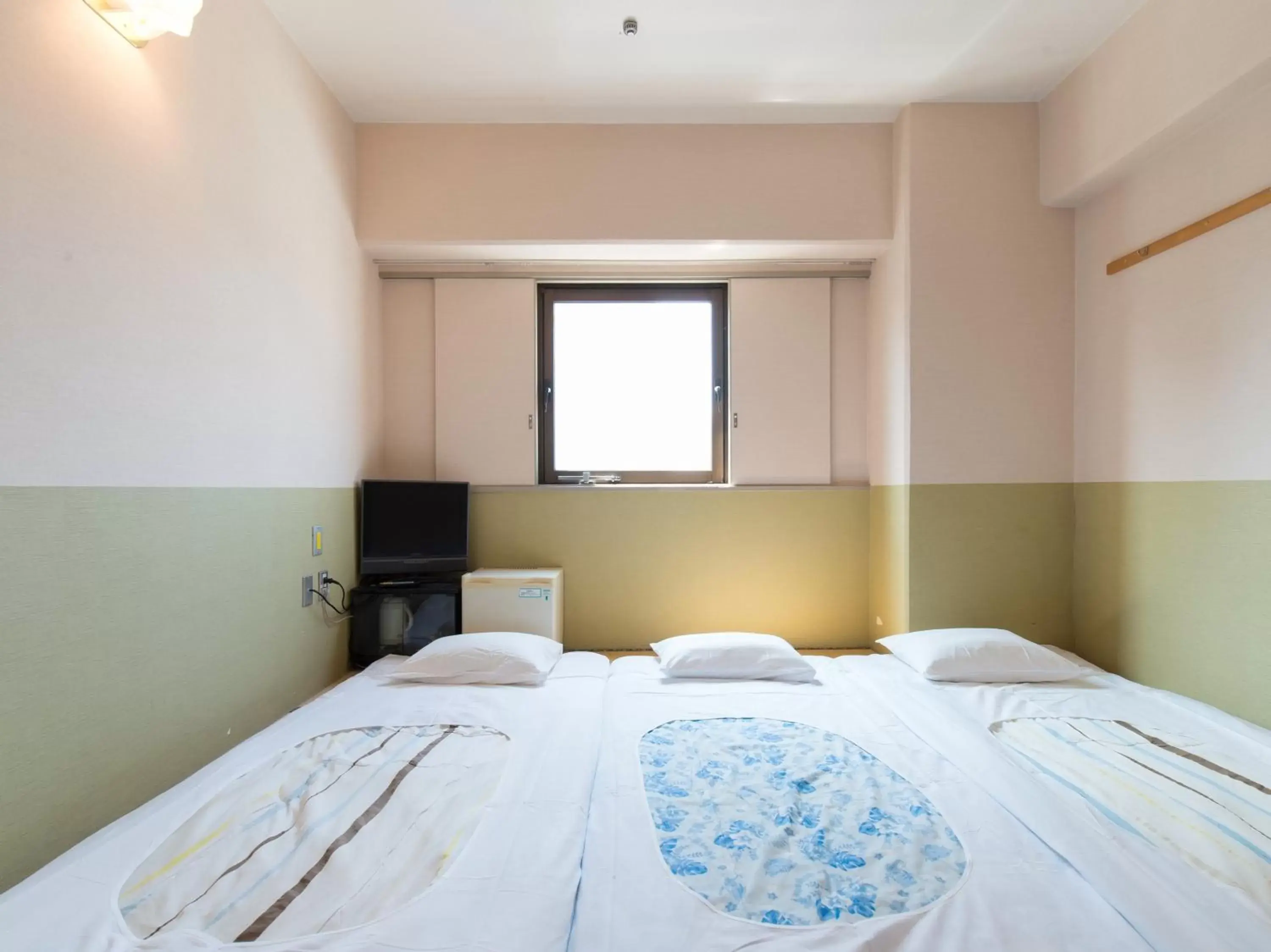 Photo of the whole room, Bed in Tabist Hotel Tetora Kitakyushu