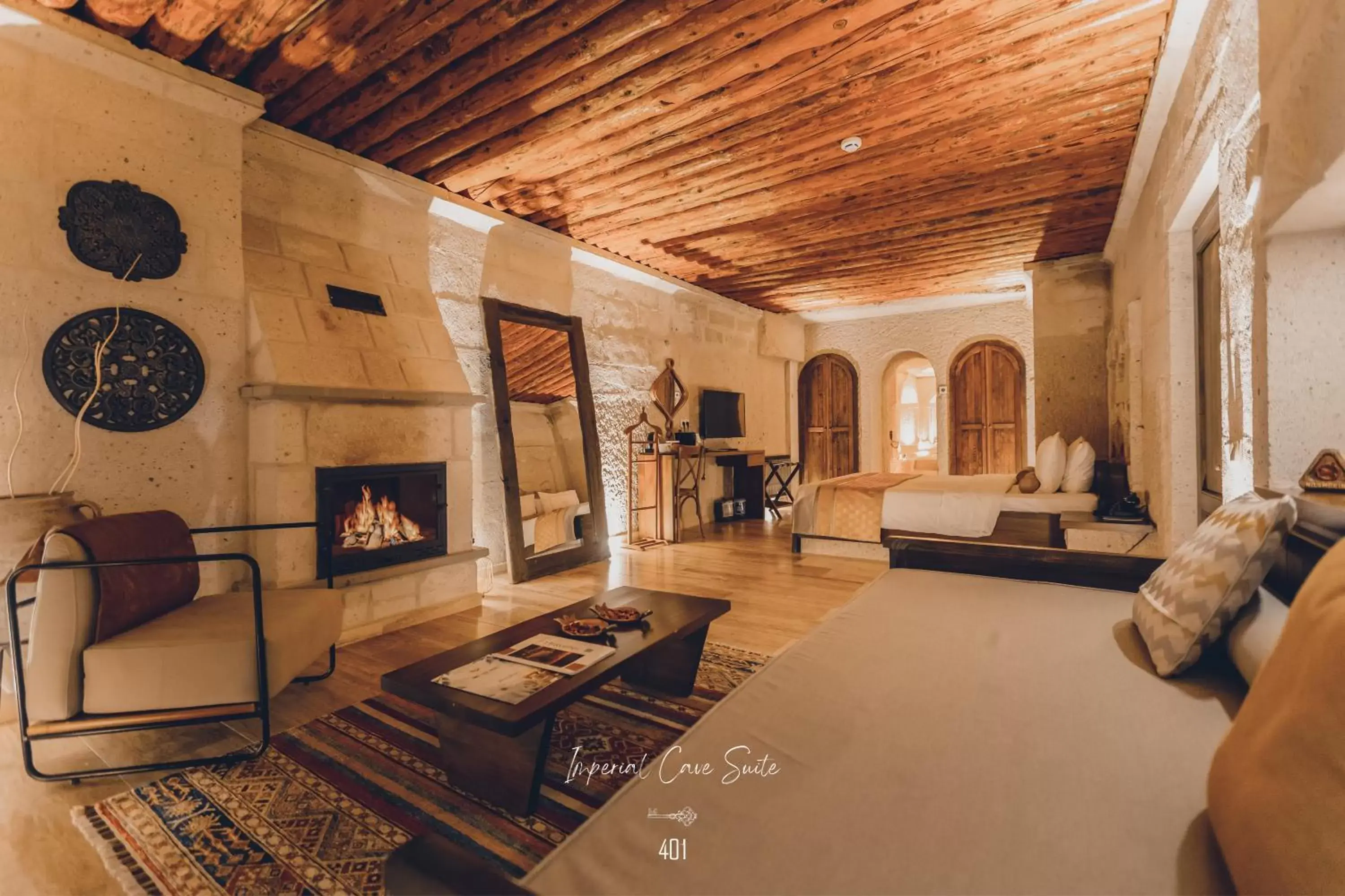 Bed, Seating Area in Nino Cave Suites