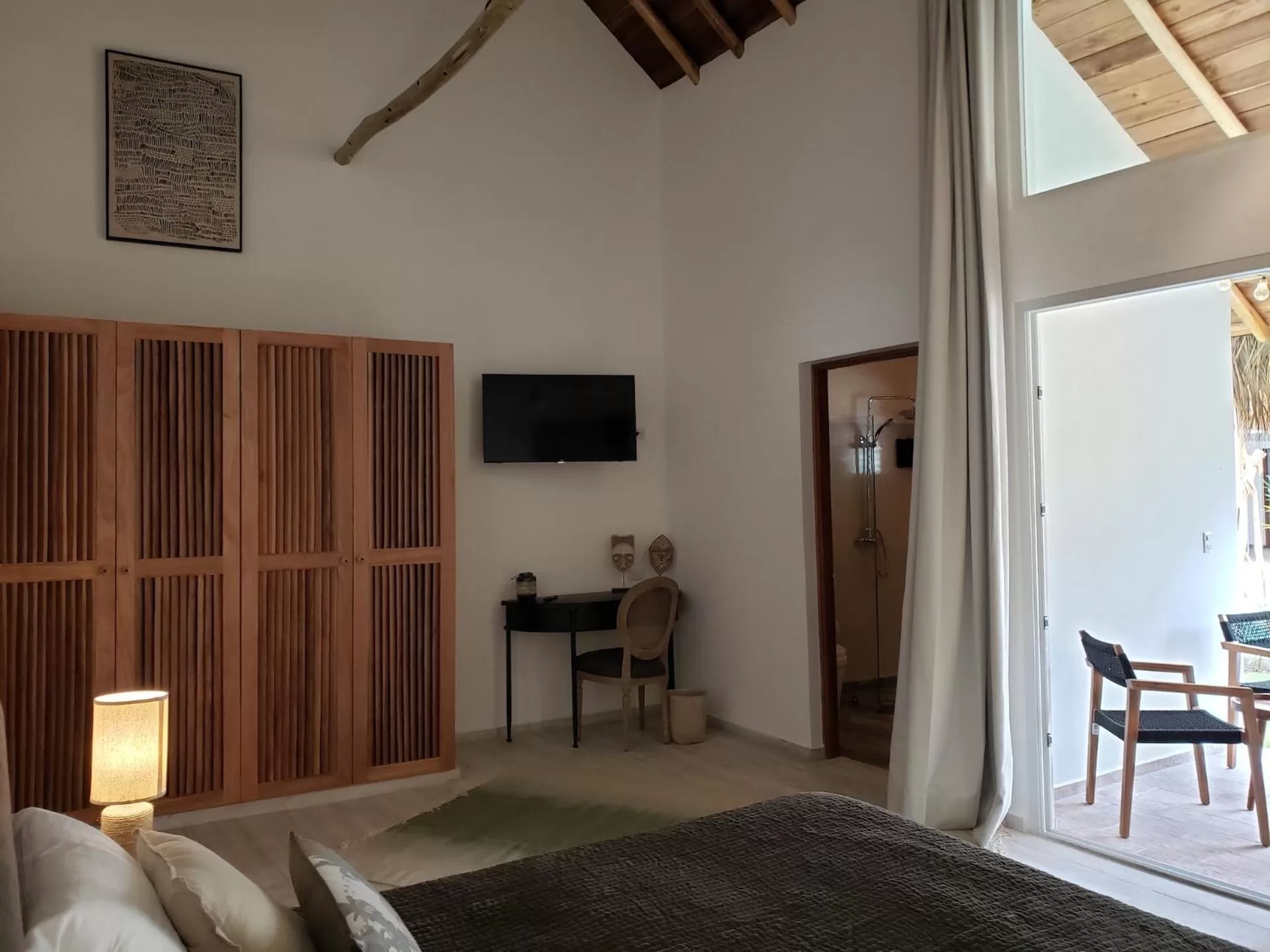 Bed in TAKUMA BOUTIK HOTEL