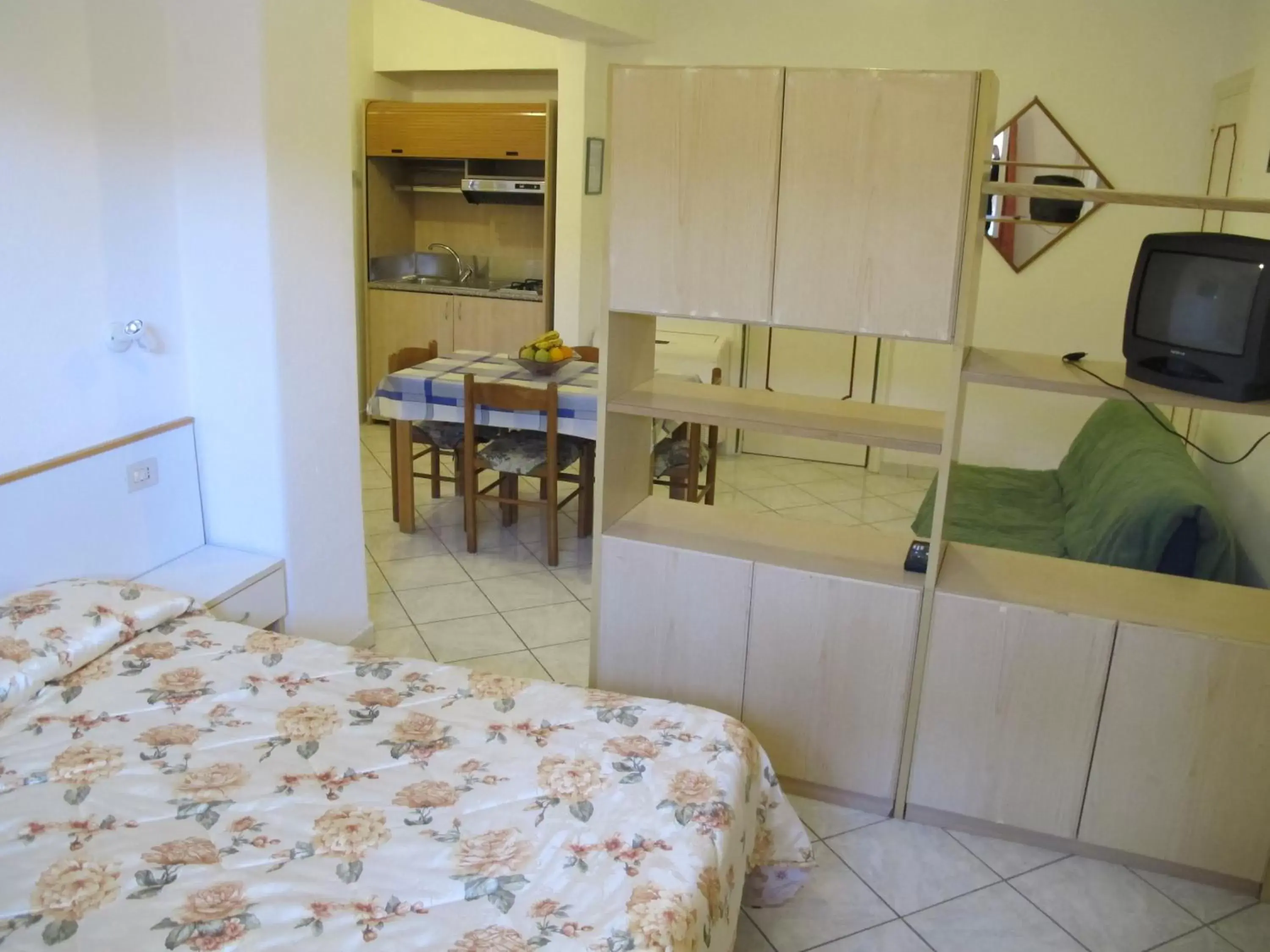 Photo of the whole room, Kitchen/Kitchenette in Aparthotel Villa Marinù