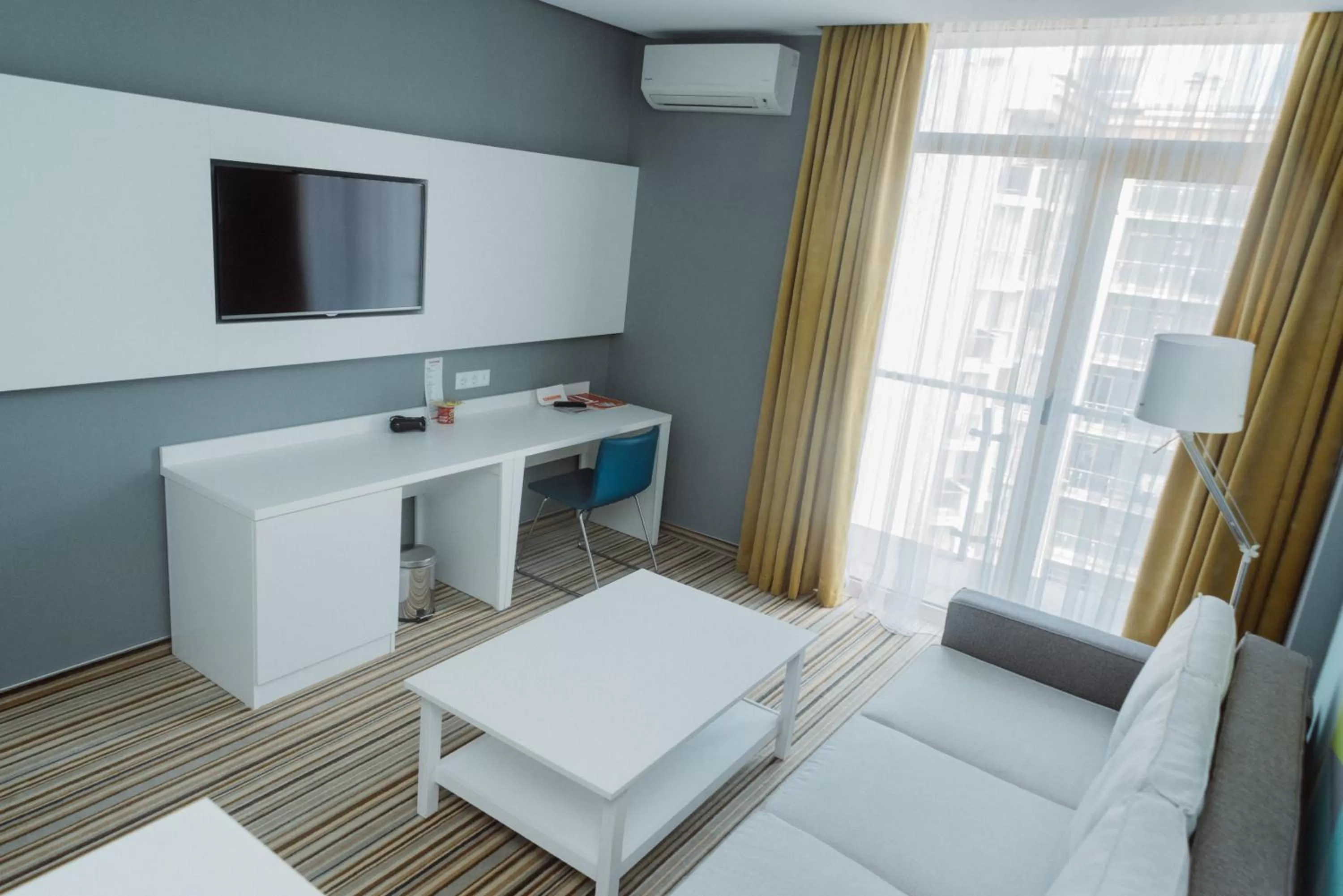 Photo of the whole room in Aparthotel Tangerine