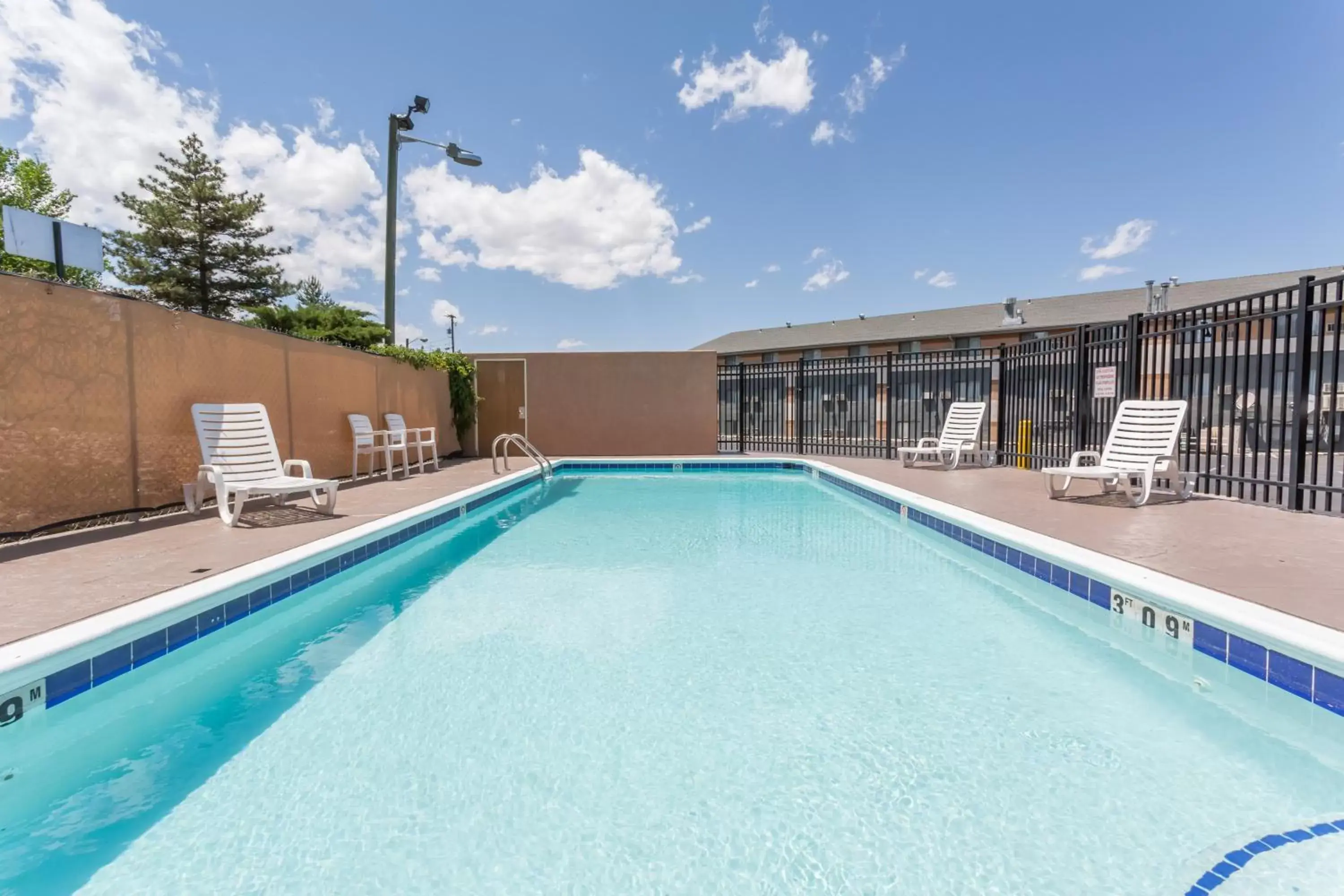 Patio, Swimming Pool in Super 8 by Wyndham Grand Junction Colorado