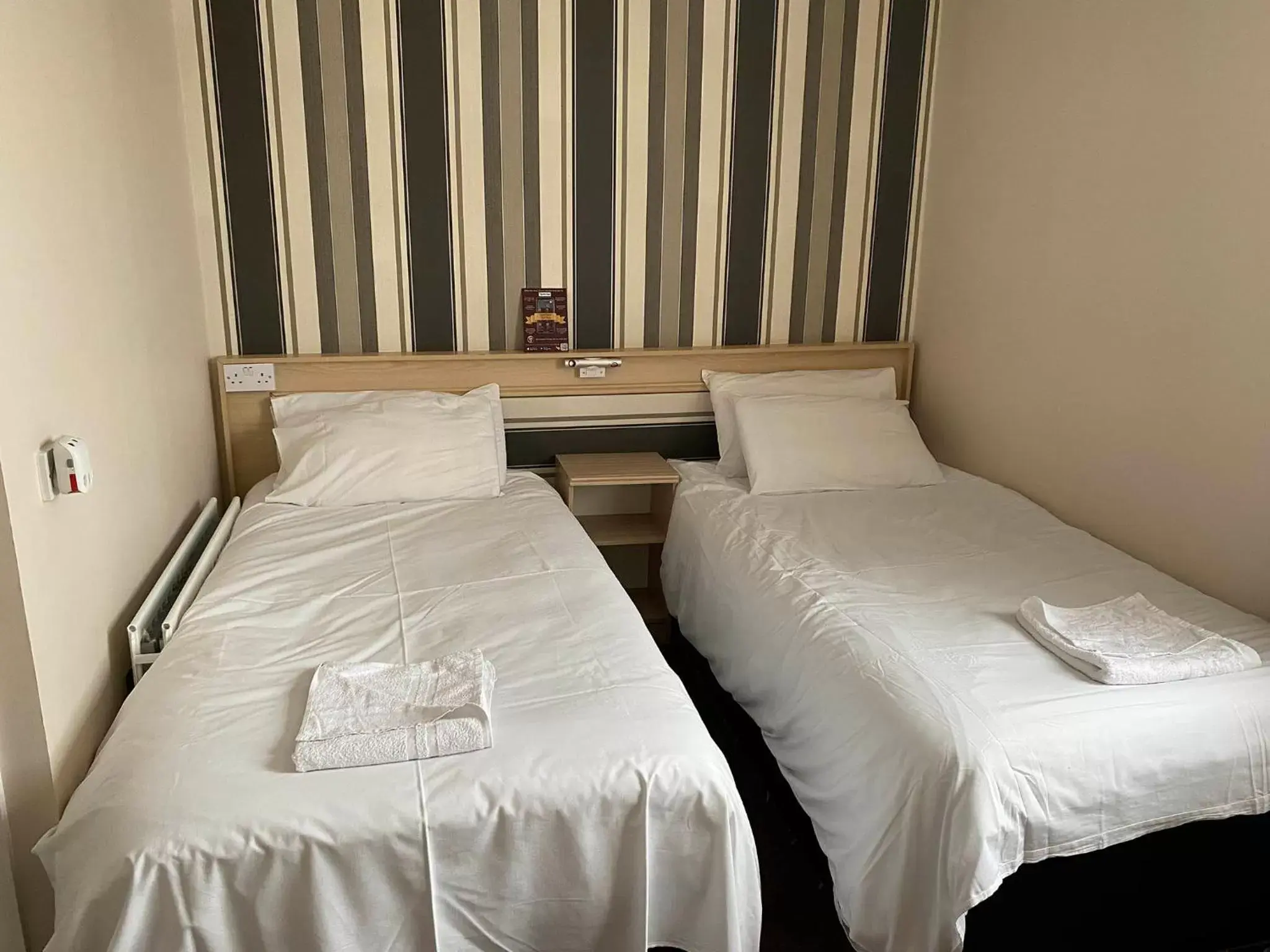 Bed in Arncliffe Lodge Hotel