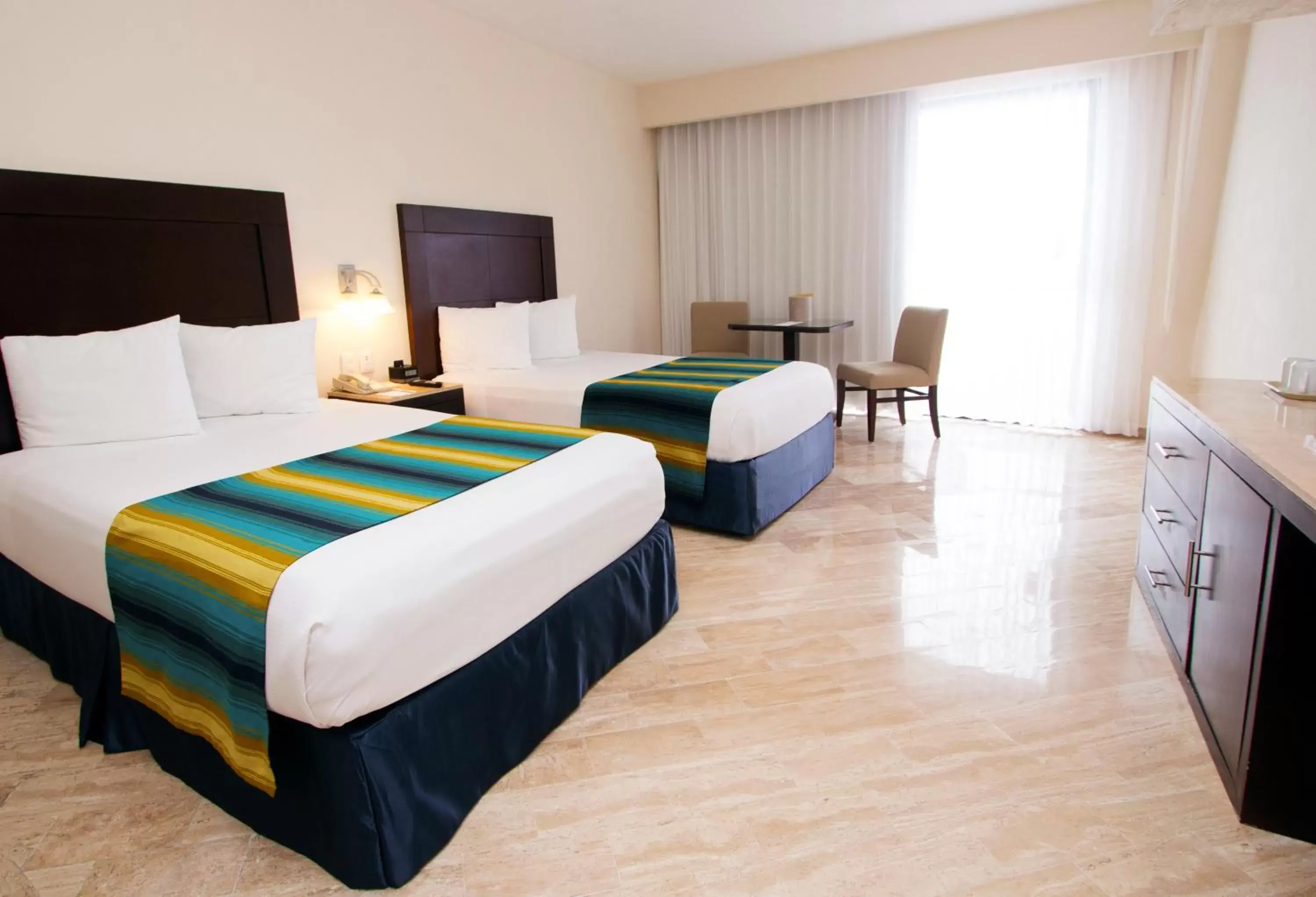 Bed in Crown Paradise Club Cancun - All Inclusive