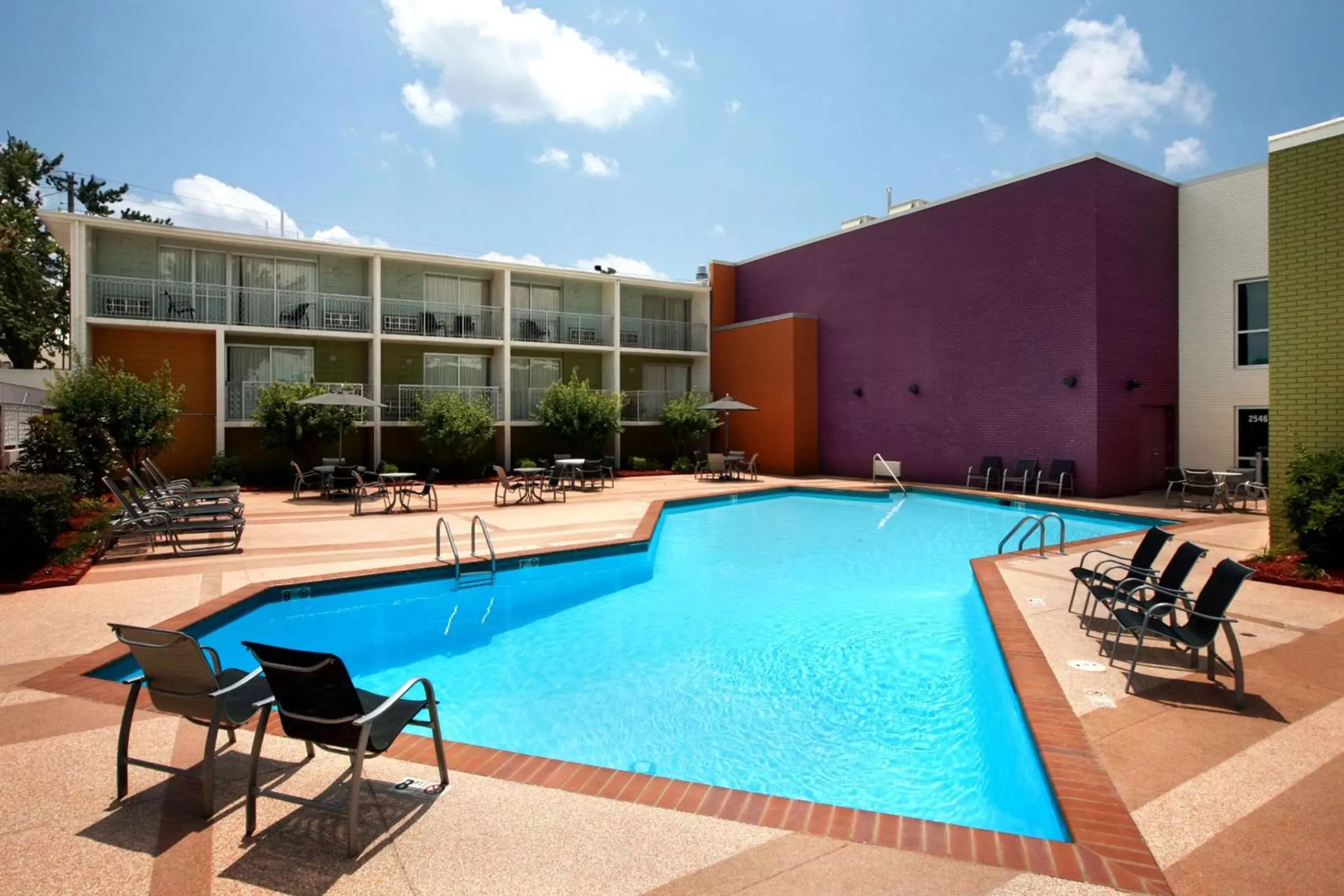 Swimming pool, Property Building in Oasis Hotel & Conv. Center, Ascend Hotel Collection