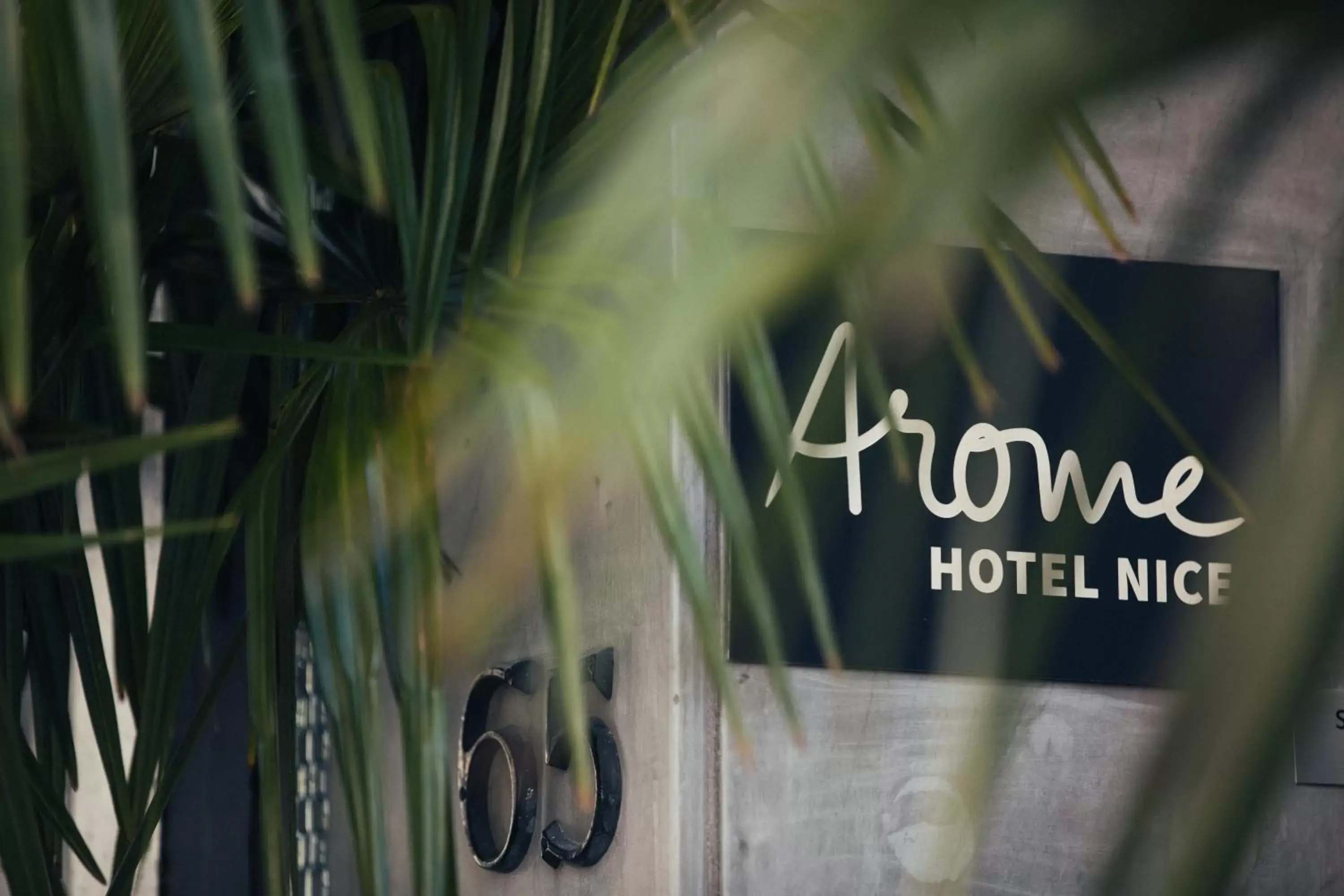 Facade/entrance in Arome Hôtel Facade/entrance in Arome Hôtel