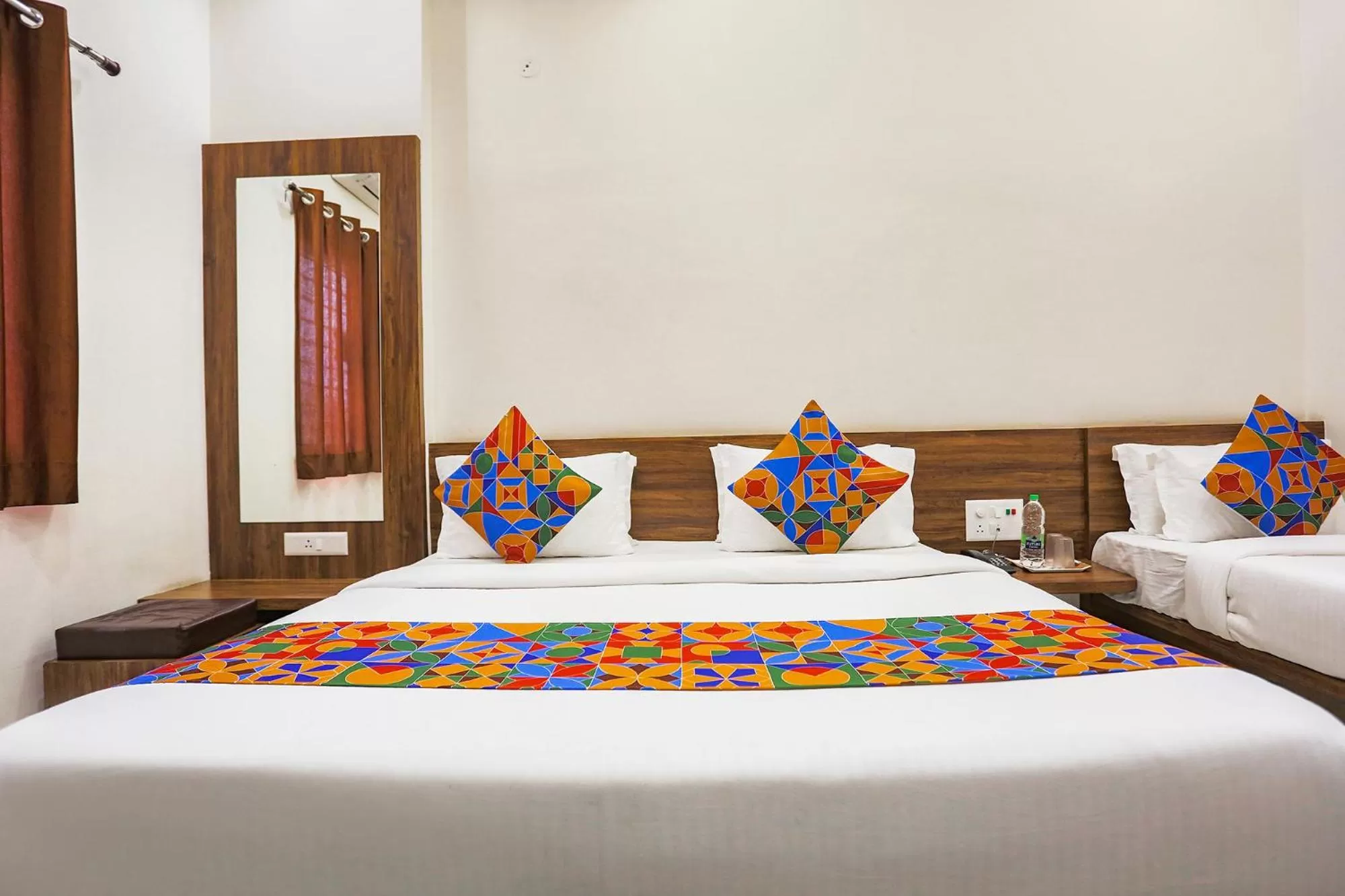 Bed in FabHotel Balaji Paradise