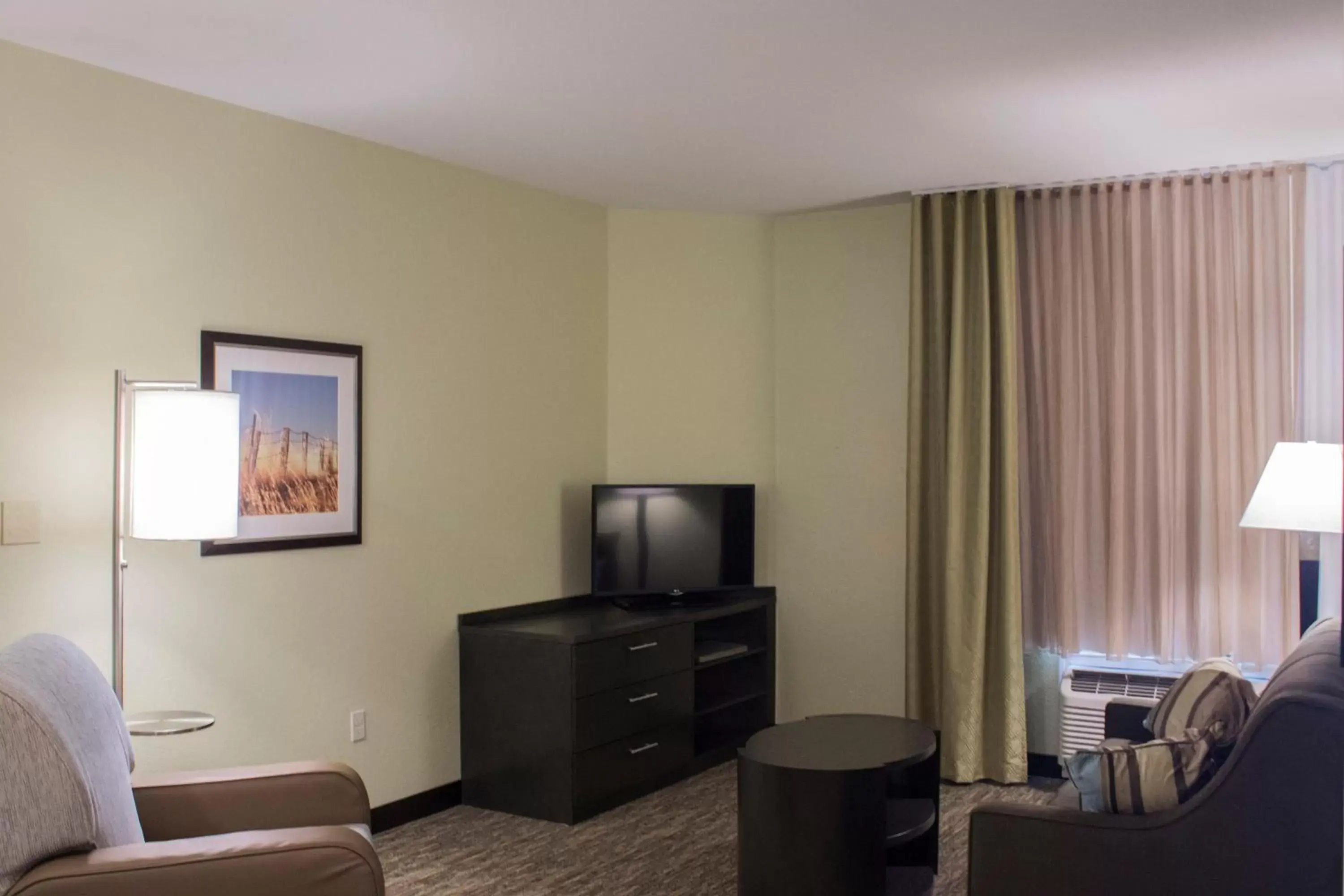 Photo of the whole room, TV/Entertainment Center in Candlewood Suites Bismarck