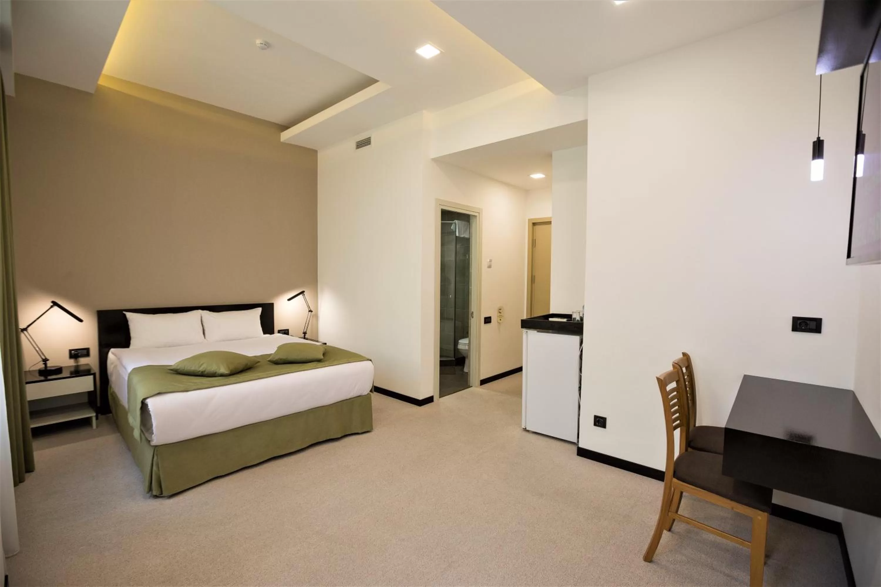 Bed in AnnaBella Boutique Hotel