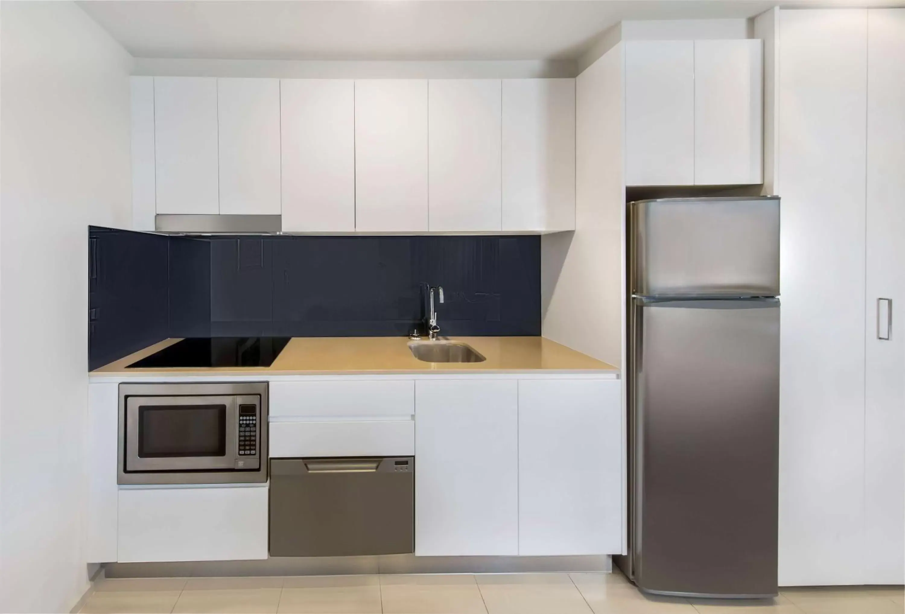 Bedroom, Kitchen/Kitchenette in Adina Serviced Apartments Canberra Dickson