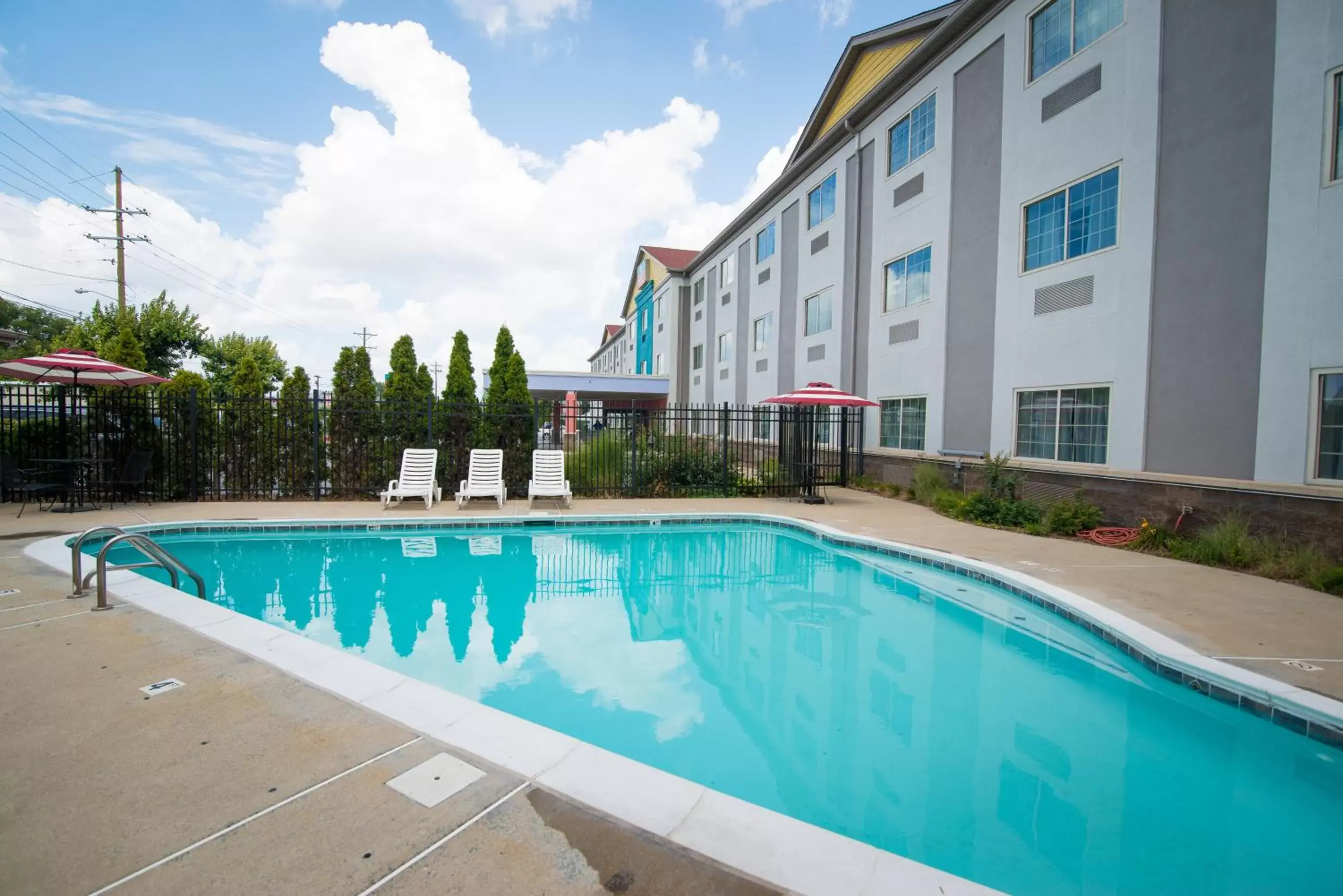 Swimming Pool in SureStay Plus by Best Western Louisville Airport Expo