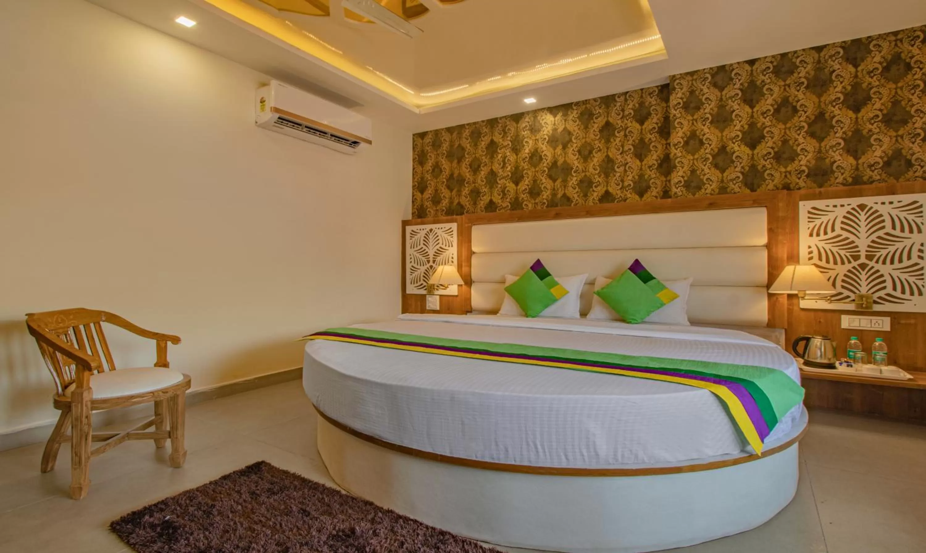 Bed in Treebo Trend Haveli Resort Roots Bhupatwala
