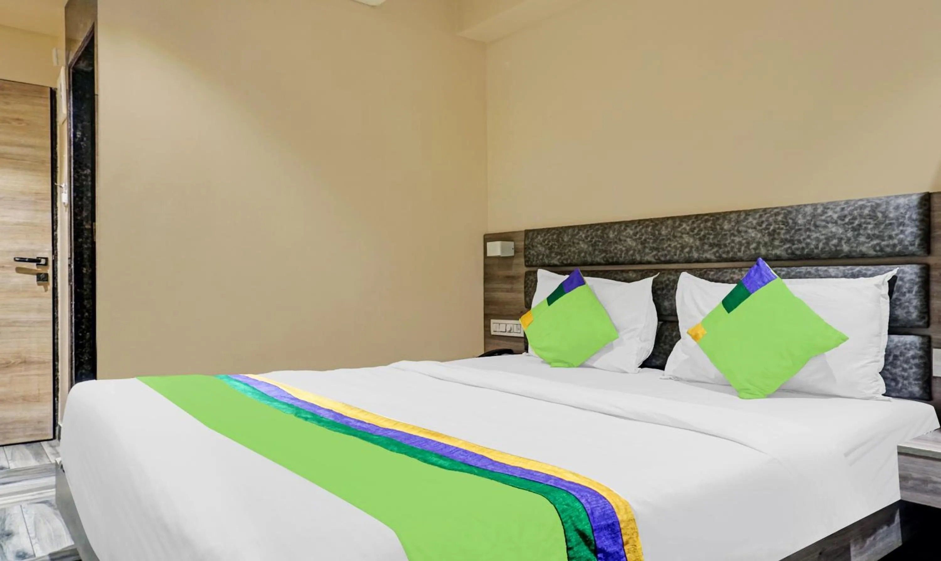 Bedroom, Bed in Treebo Classic Grande, Camp